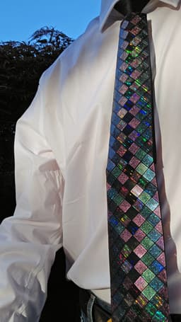 Diamond pattern tie cover with snap fasteners 3d model