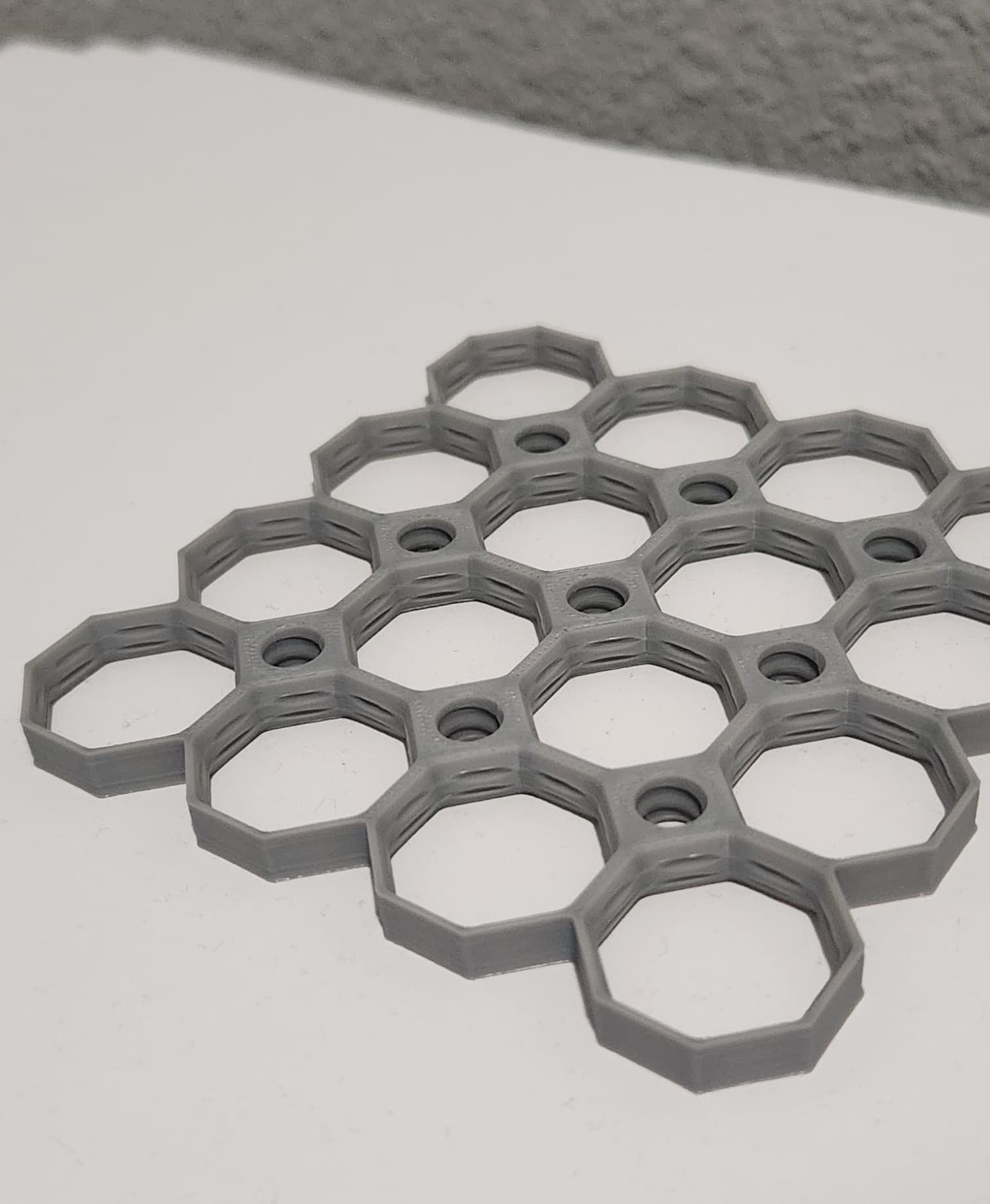 Awesome print. Looking forward to having a bunch! Pictured is PLA.
