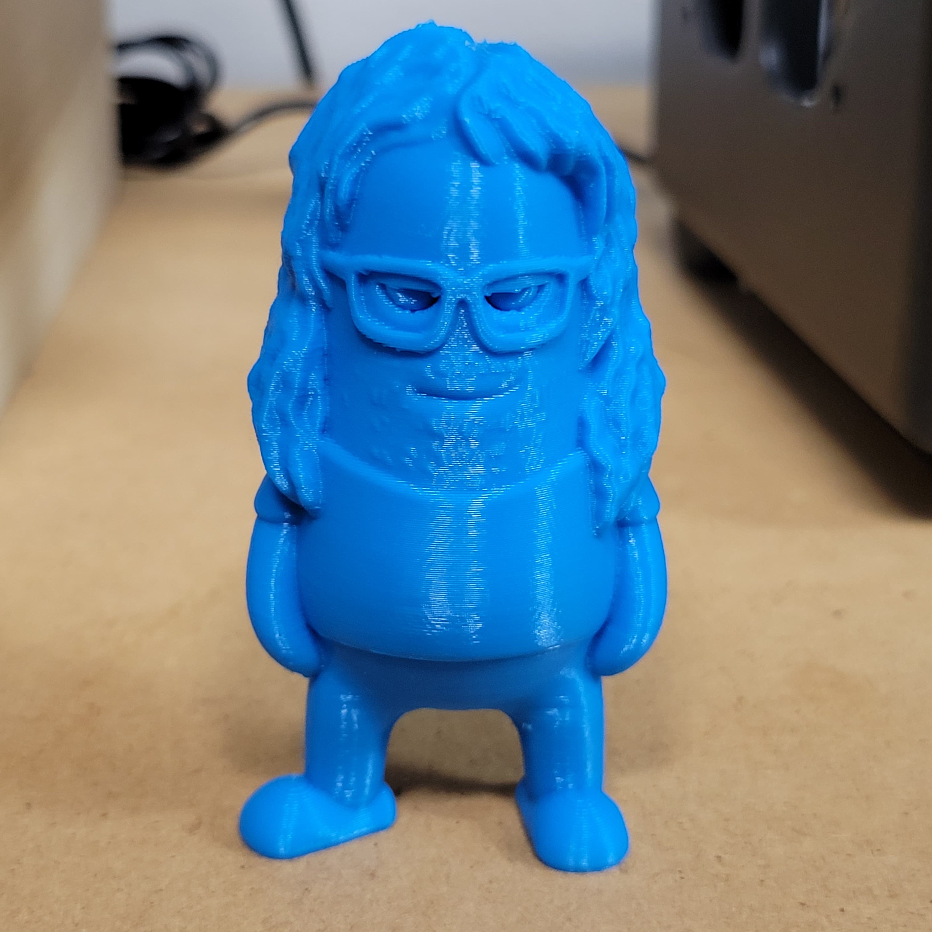 Mini Jim in Printed Solid Pure Cyan PLA at 0.2 mm layer height. Printed on MakerGear M3-ID.