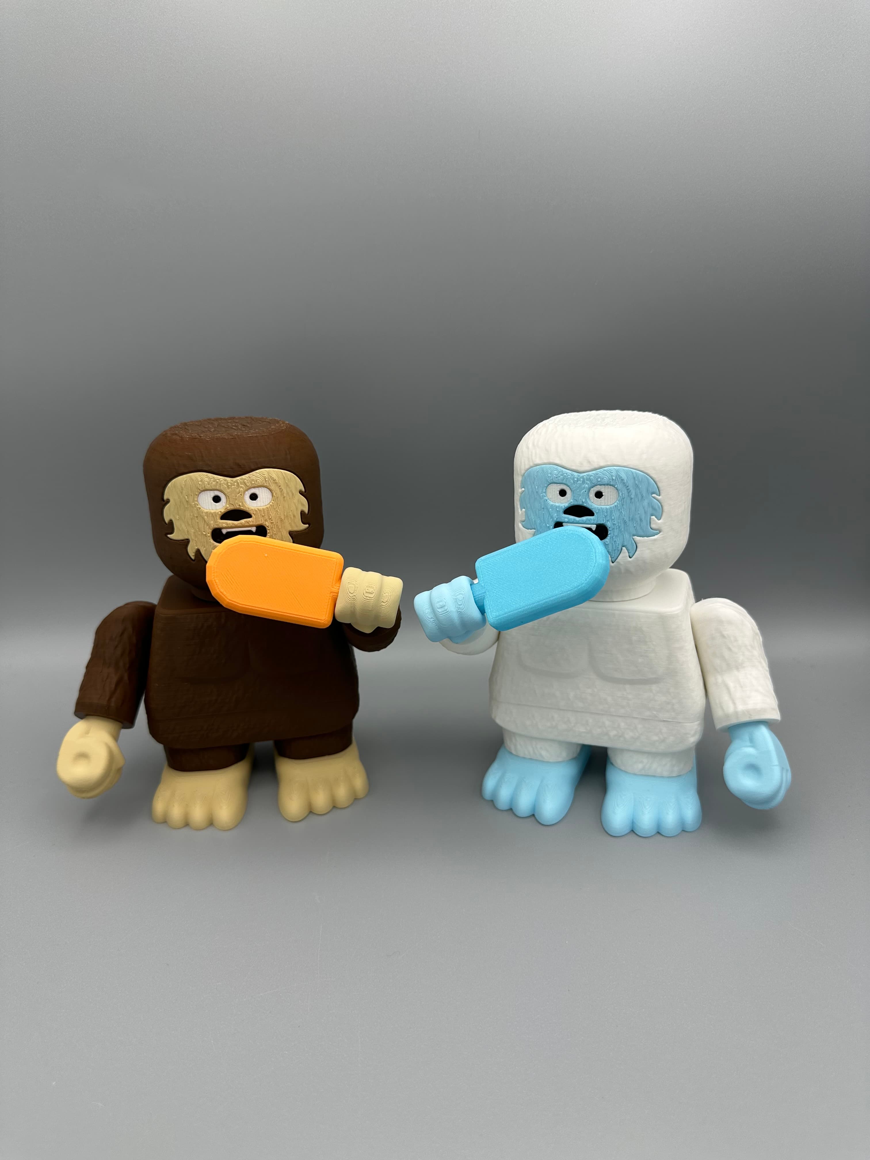Bigfoot and Yeti enjoying some ice pops