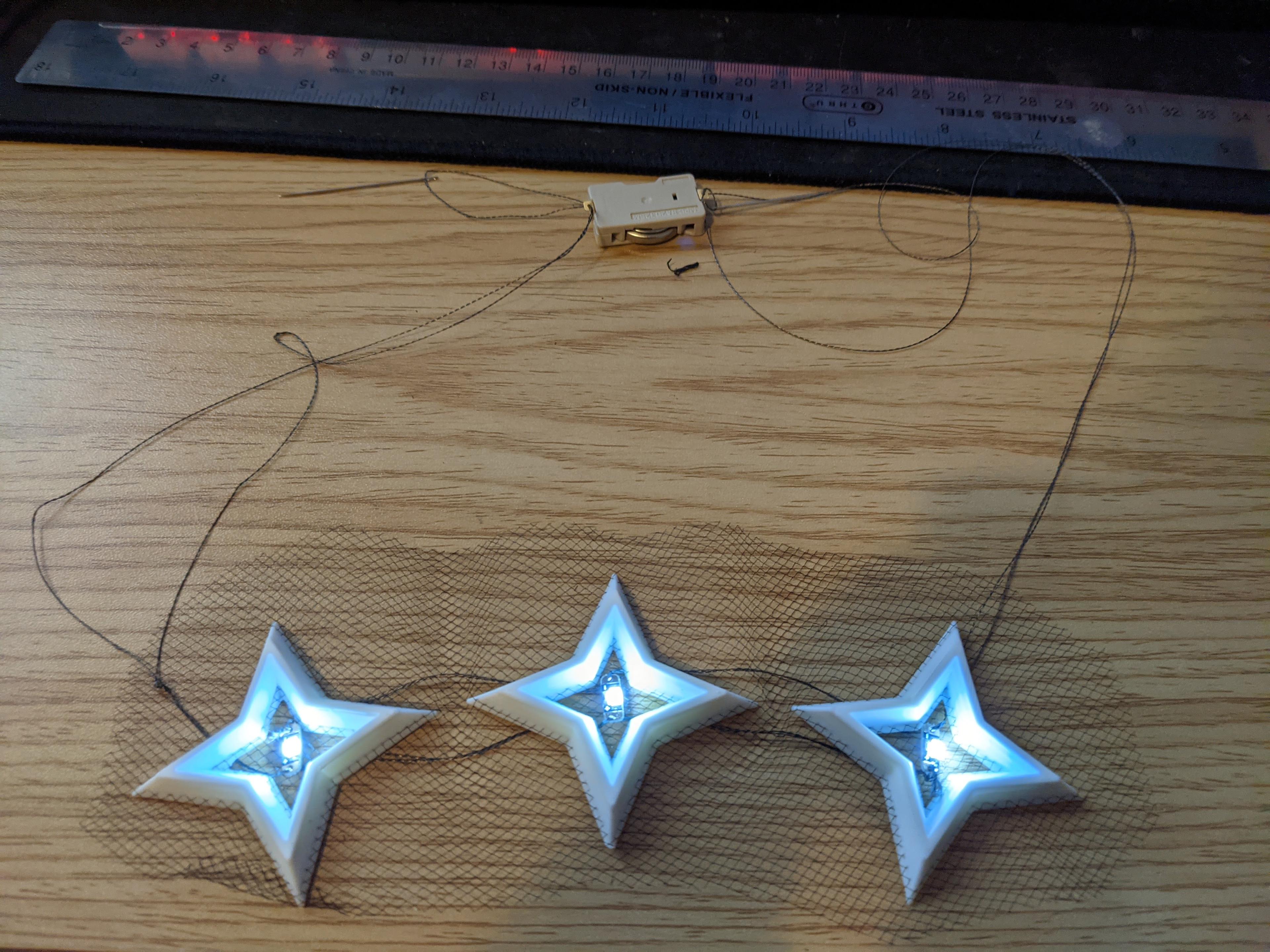 Floating LED Star Necklace (3D print on Fabric, e-textiles) 3d model