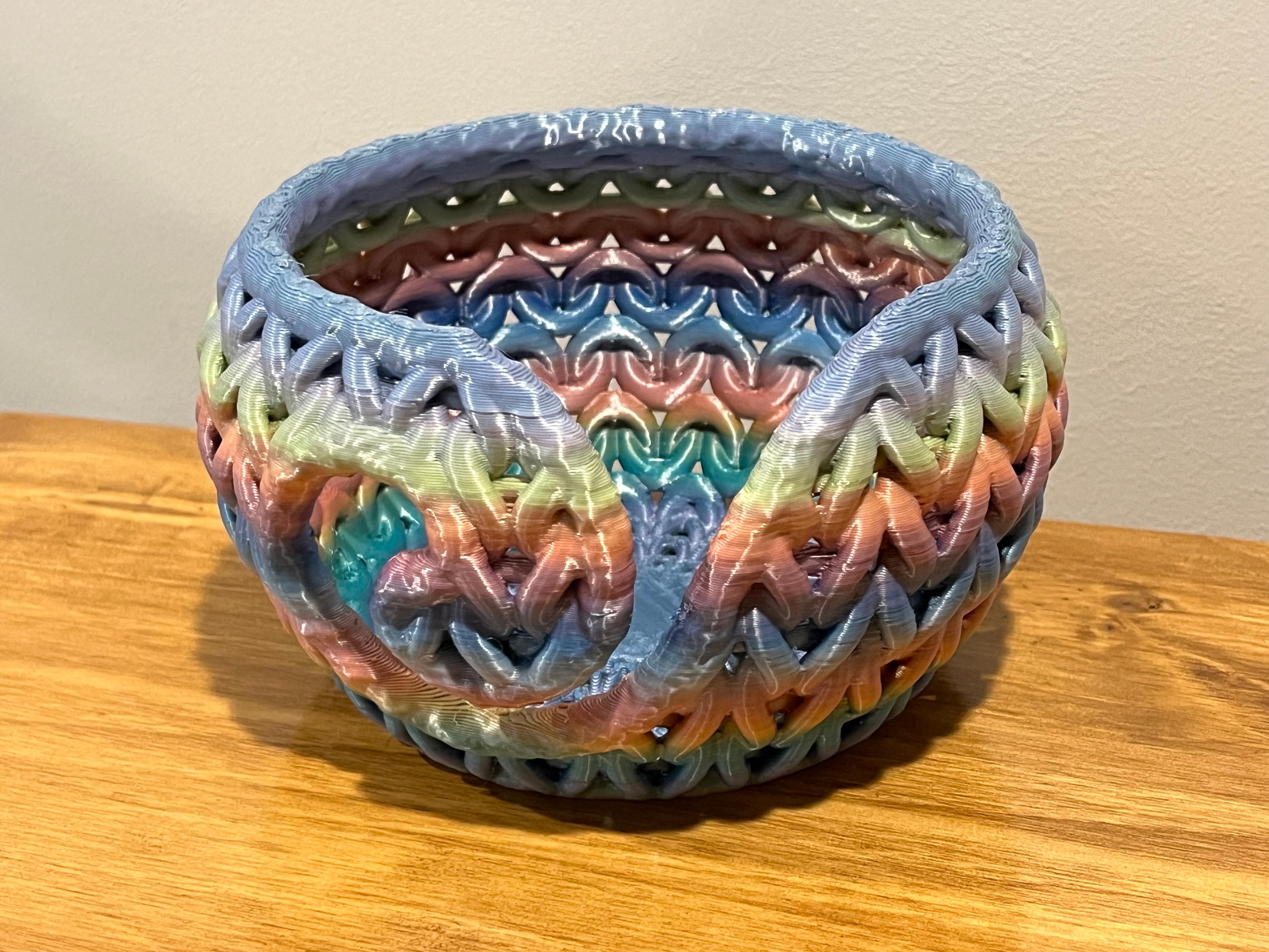 Yarn Bowl - Prusa Mini, 0.4mm layer height, 0.8mm nozzle, PrusaSlicer. Custom supports for the front swirl. YOUSU Rainbow PLA Filament. - 3d model