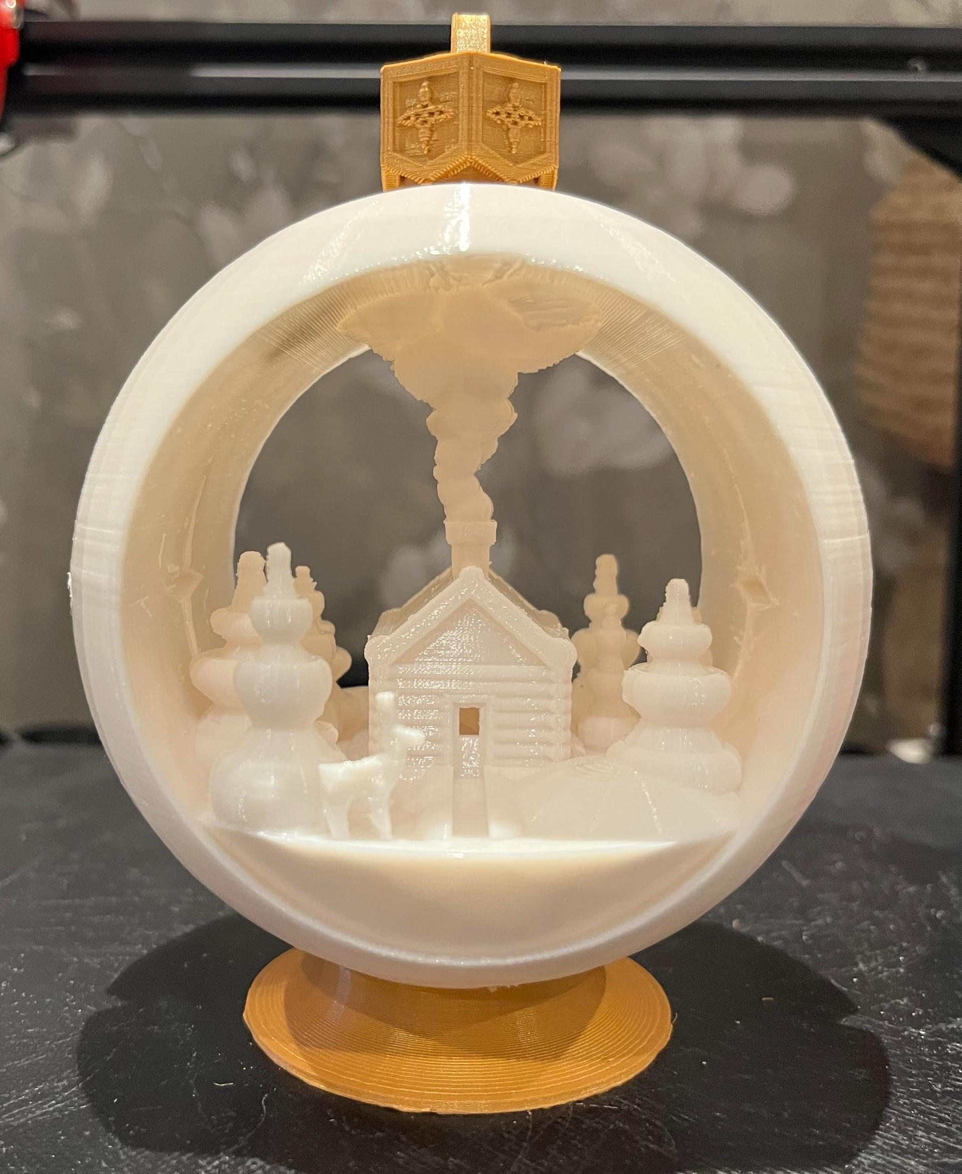 Snow Globe Votive Ornament - Winter Cabin - Printed beautifully!!! A tip to all of you who have had trouble with the smoke breaking off. I printed the model without Z-hop all the way up to the smoke stack then added Z-hop 0,5mm the rest of the way up. That way the nozzle won't hit the print when moving. I'm using Cura 5.5 and there is a way to add Z-hop later in the model under Extensions/Post Processing/Modify G-Code/Alter Z-hops layer-to-layer. You have to add it manually just following this link.

https://github.com/Ultimaker/Cura/issues/15280 - 3d model