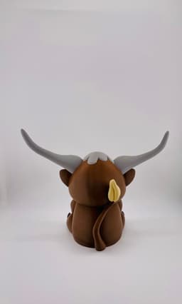 Plain Longhorn Cow Sitting 3d model