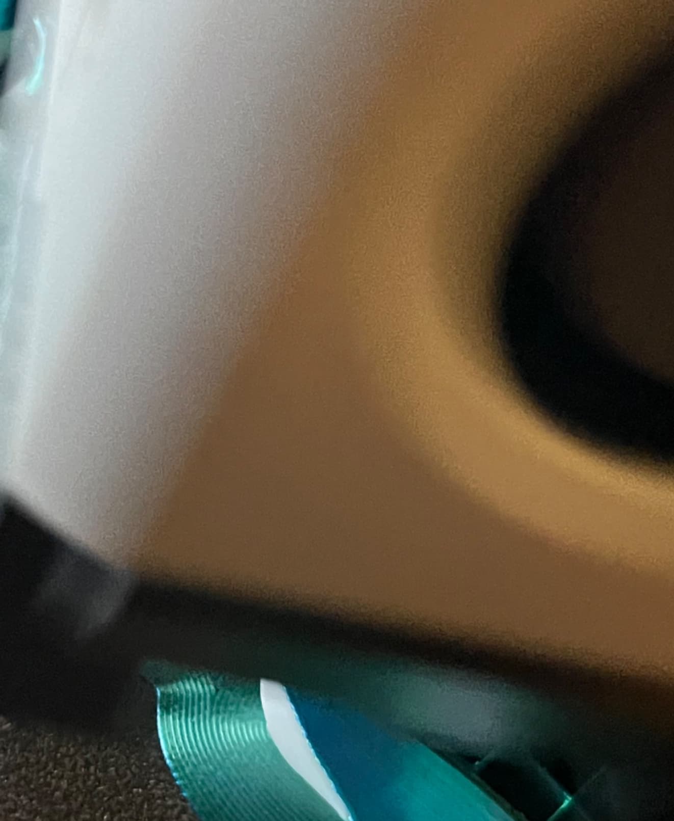 White shows through the outer coloured layer. This is the second print with the exact same flaw. Very cool print otherwise.