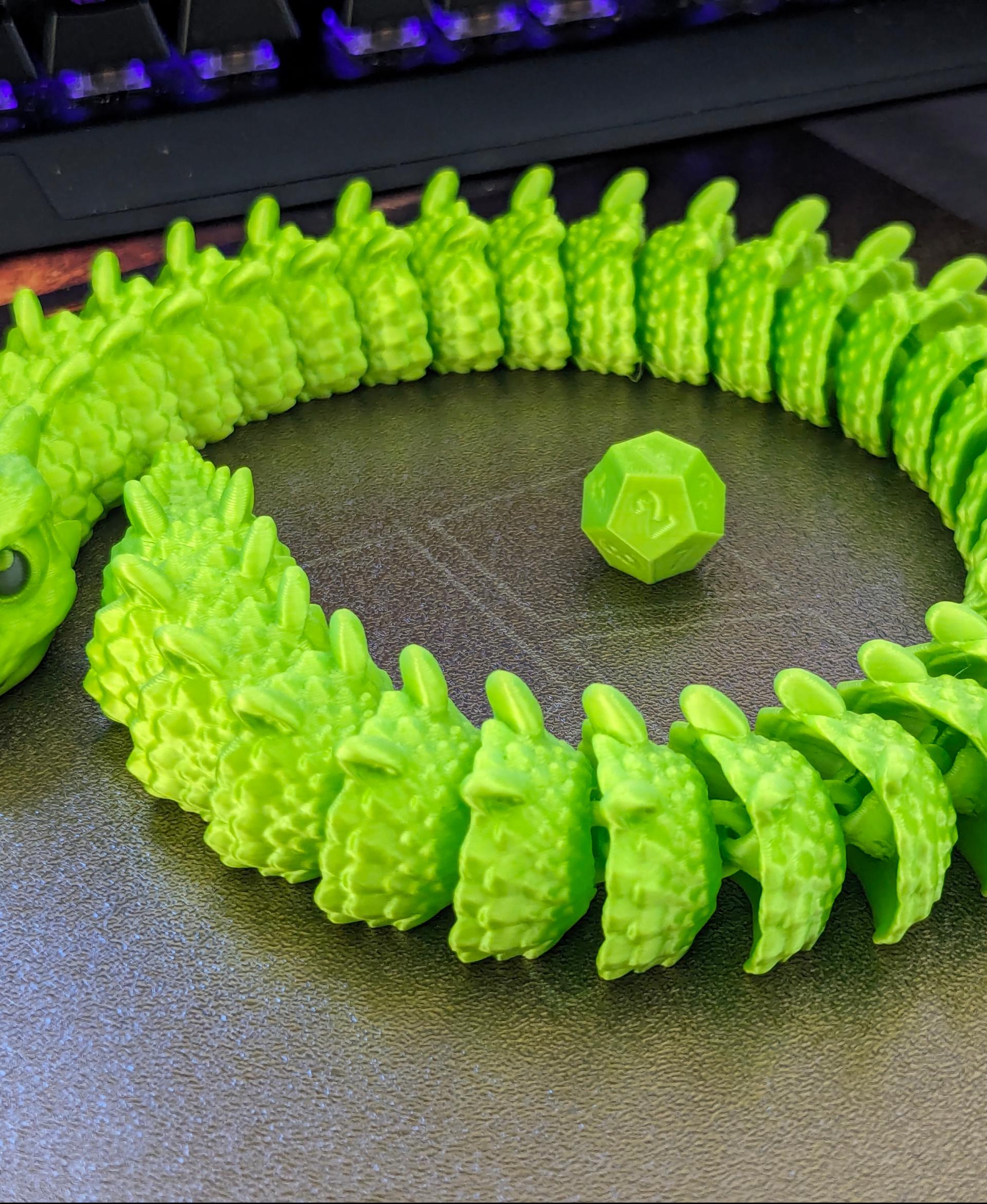 Baby Basilisk (Extra Long) - Articulated Snap-Flex Fidget (Medium Tightness Joints) - Printed on a Bambu Lab P1S, with Duramic 3D Silk PLA in neon green. - 3d model