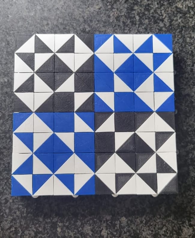 Do you see the four Japanese Samurai AND the four tigers?
I also made the sides of the Auxetic cube in three colors: blue, white and black!