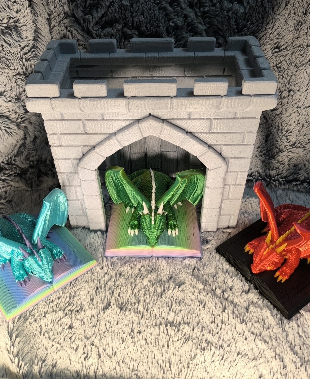 Book with Matte PLA, Horns in regular PLA or translucent PLA and Dragon in silk-PLA, Castle in Marple PLA