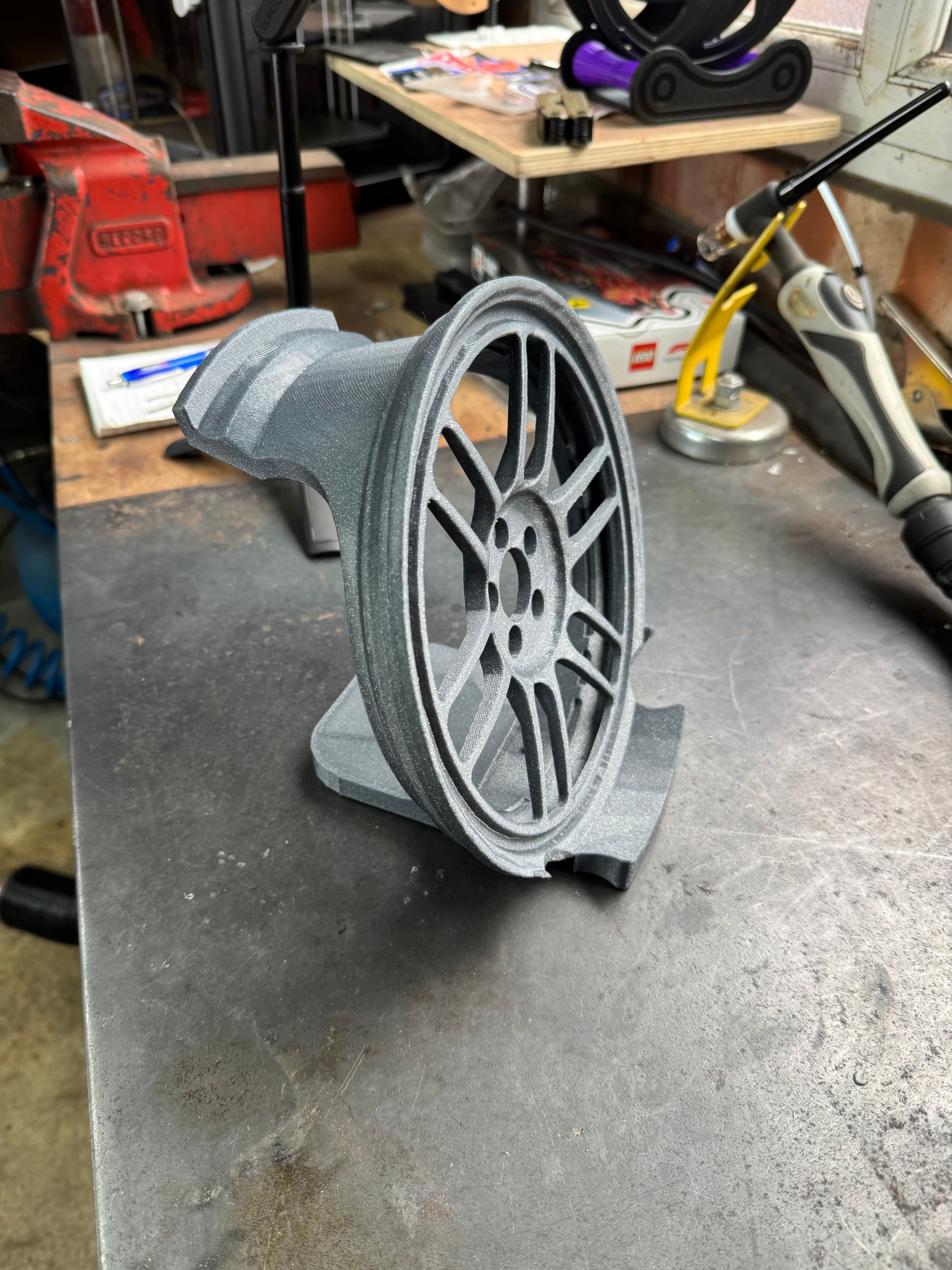 Made with sparkle silver PLA had to scale it down to 96% to fit my print bed but still works a treat! Printed in just under 13 hours
Is it possible to get this as just a headset stand without the cut out for the controller, like the RPF1 desk trinket but with the headset stand on the back
Thanks!!
