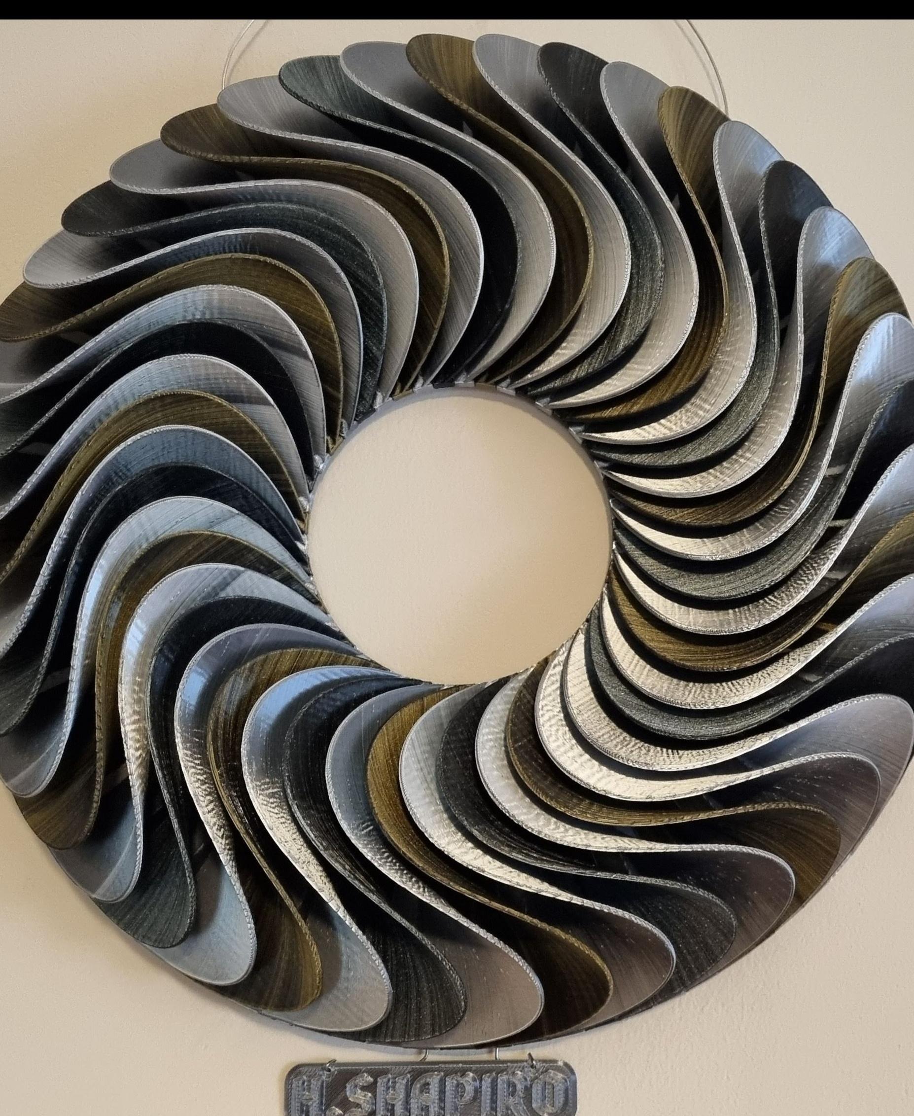 Wavey Loop Wall Sculpture - I printed it at 50% scale using three different silk dual color filaments. Had to make some adjustments to the screw holes in the base. Used about 0.7kg filament and M2 screws. - 3d model