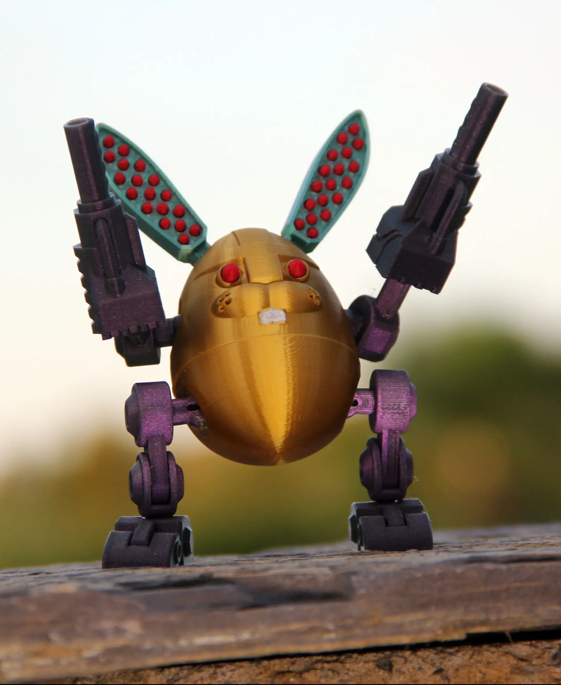 Easterbunny bot on top of the world, printed in Polymaker PolyLite Silk Gold, Dual Silk Jadeite, Starlight Nebula