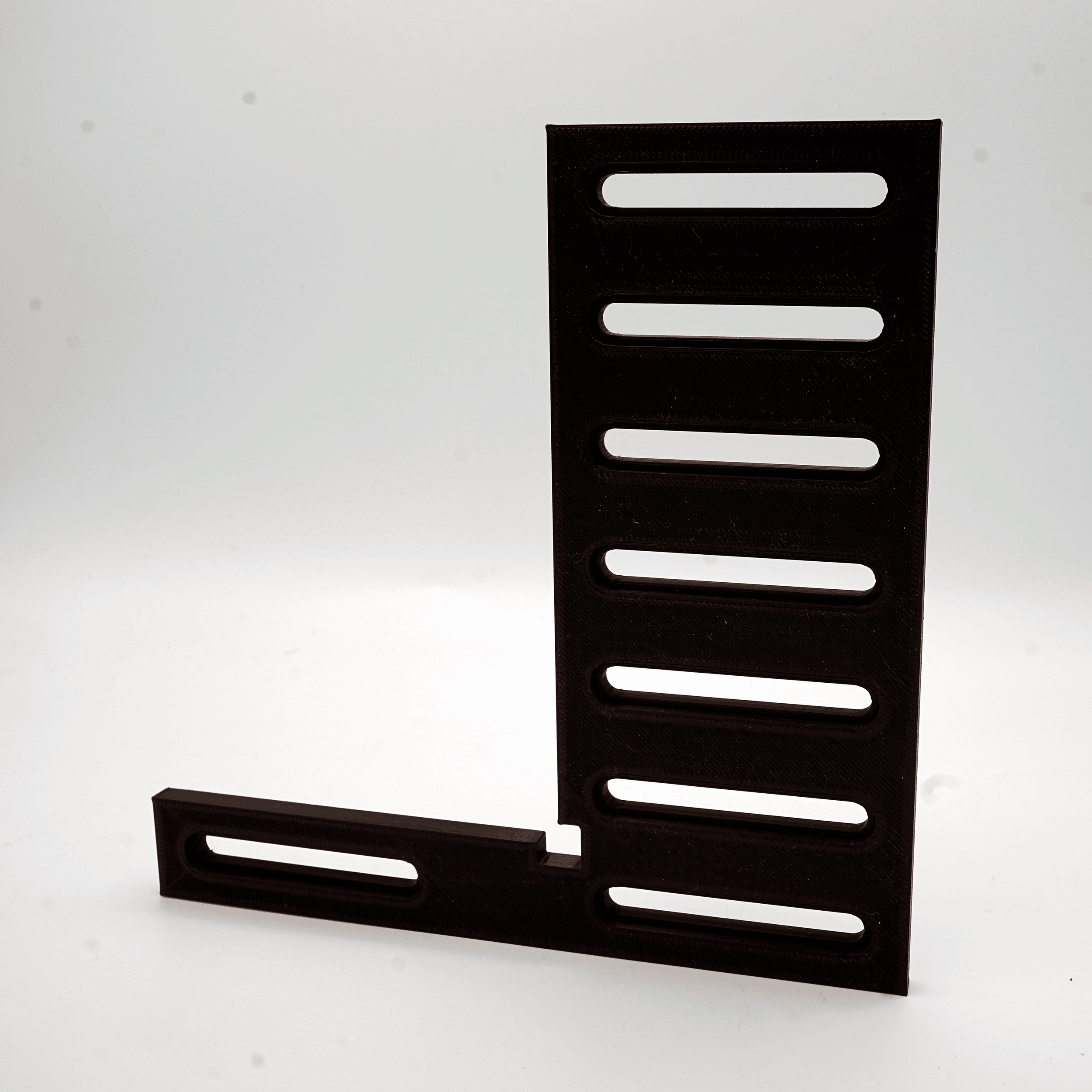 Low-Profile Sliding Right Angle Jig - Sliding clamp is 1/4" thick and can be used for wasteboards with a hole spacing of 10 or 25mm spacing - 3d model