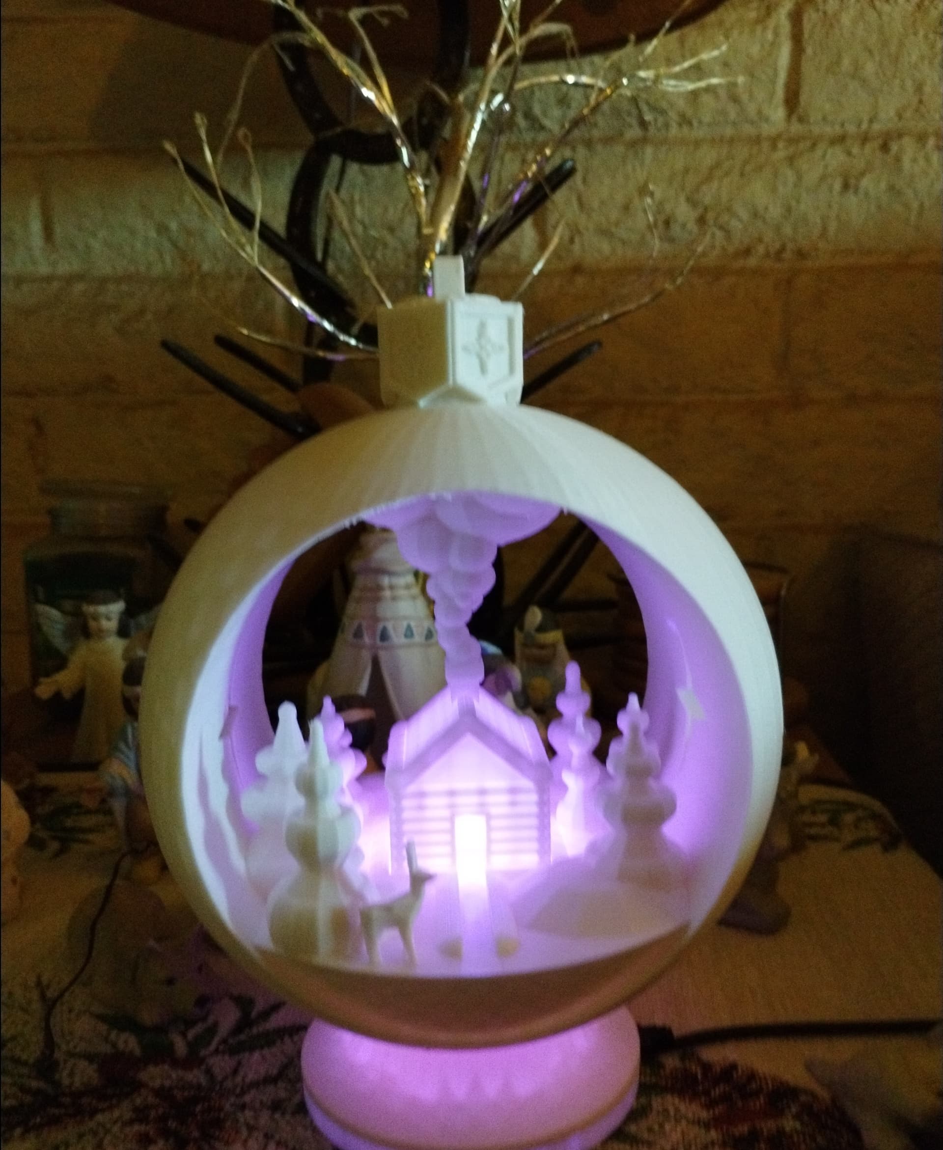 Made this for my mom for Christmas. My fiance designed a base that fits up in side it. That's where I put the lights!! I also blew it way up.