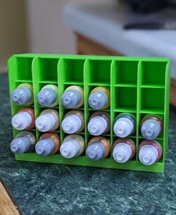 A one half oz paint bottle holder that holds 24 bottles 3d model