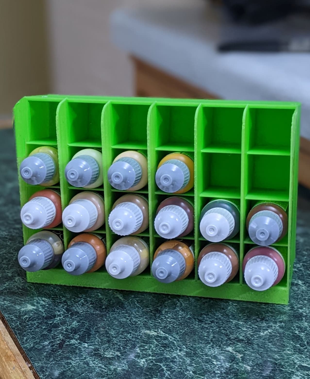 A one half oz paint bottle holder that holds 24 bottles 3d model