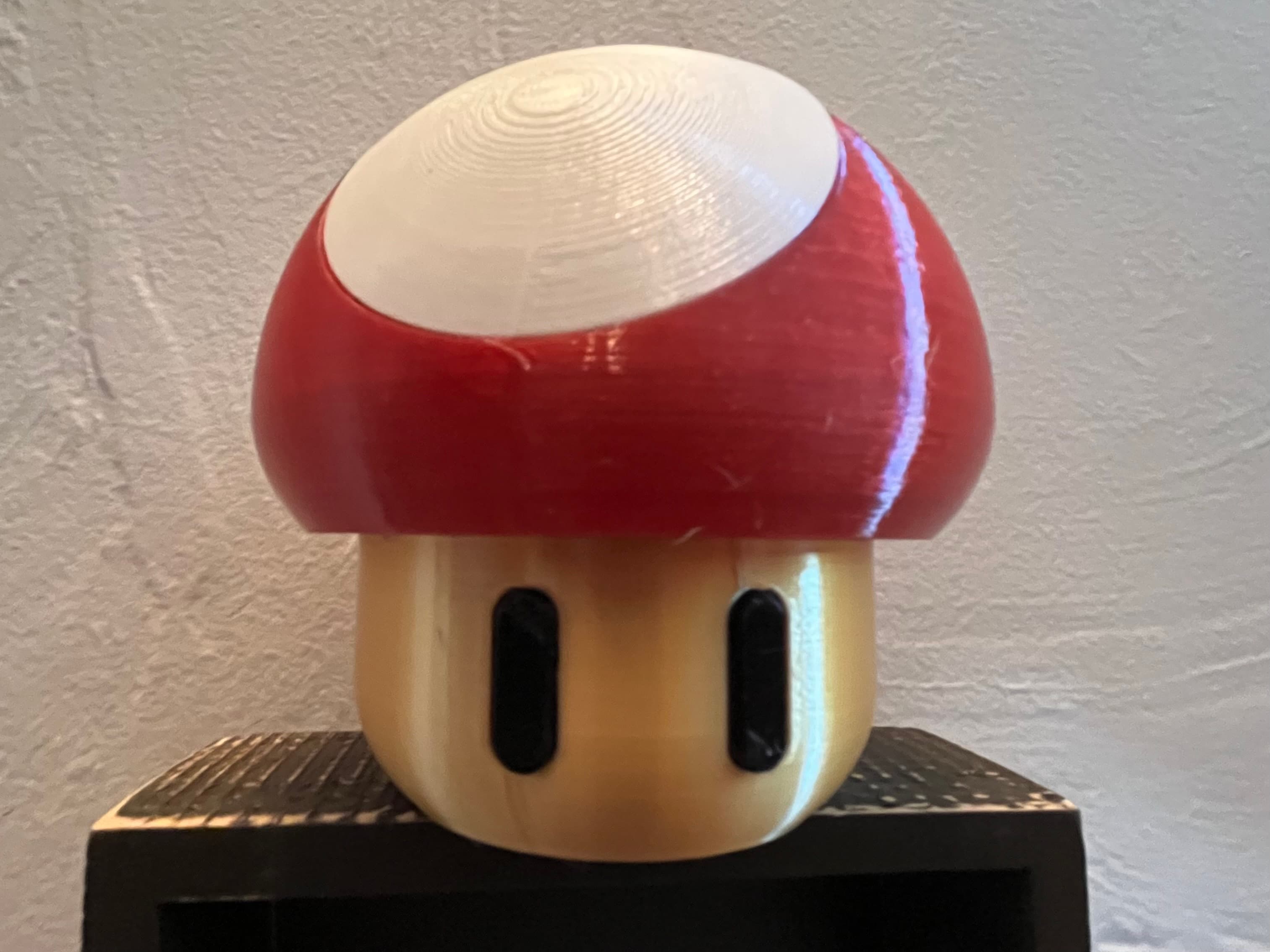 Color is a little off on the stem, but it's a great model. I'd recommend moving the seam to the rear on the top and bottom otherwise it appears on the front because the eyes are the only detail on the bottom.
