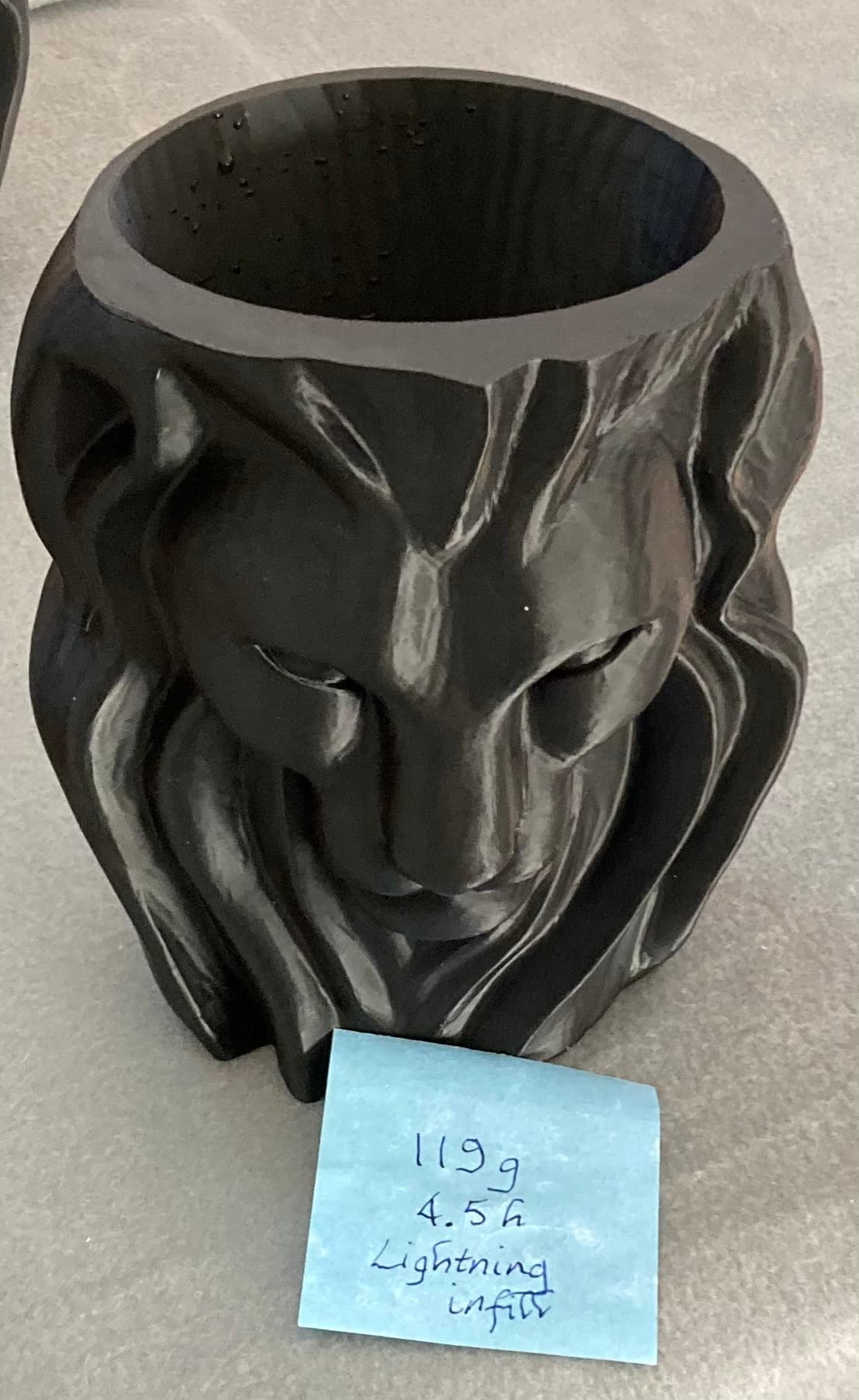 This was a bit of an experiment. I printed the model twice, first with grid infill and then with lightning infill. Lightning printed more than twice as fast with 60% less filament. Both were watertight. (The gold eyes on the grid print were painted on).