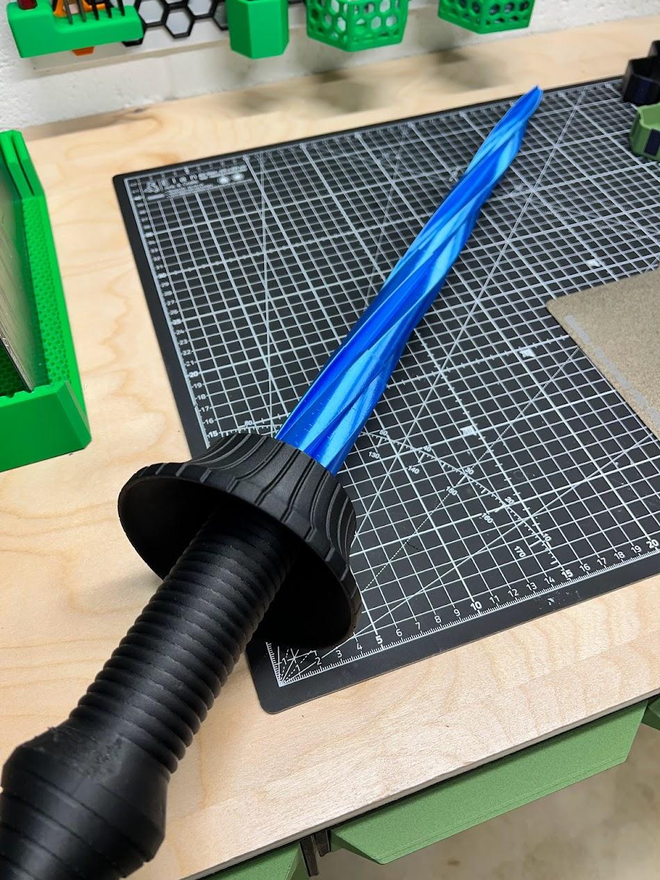 Collapsing Drill Sword Print-in-Place - PETG-CF for the hilt and BambuLab blue silk for the blade. - 3d model