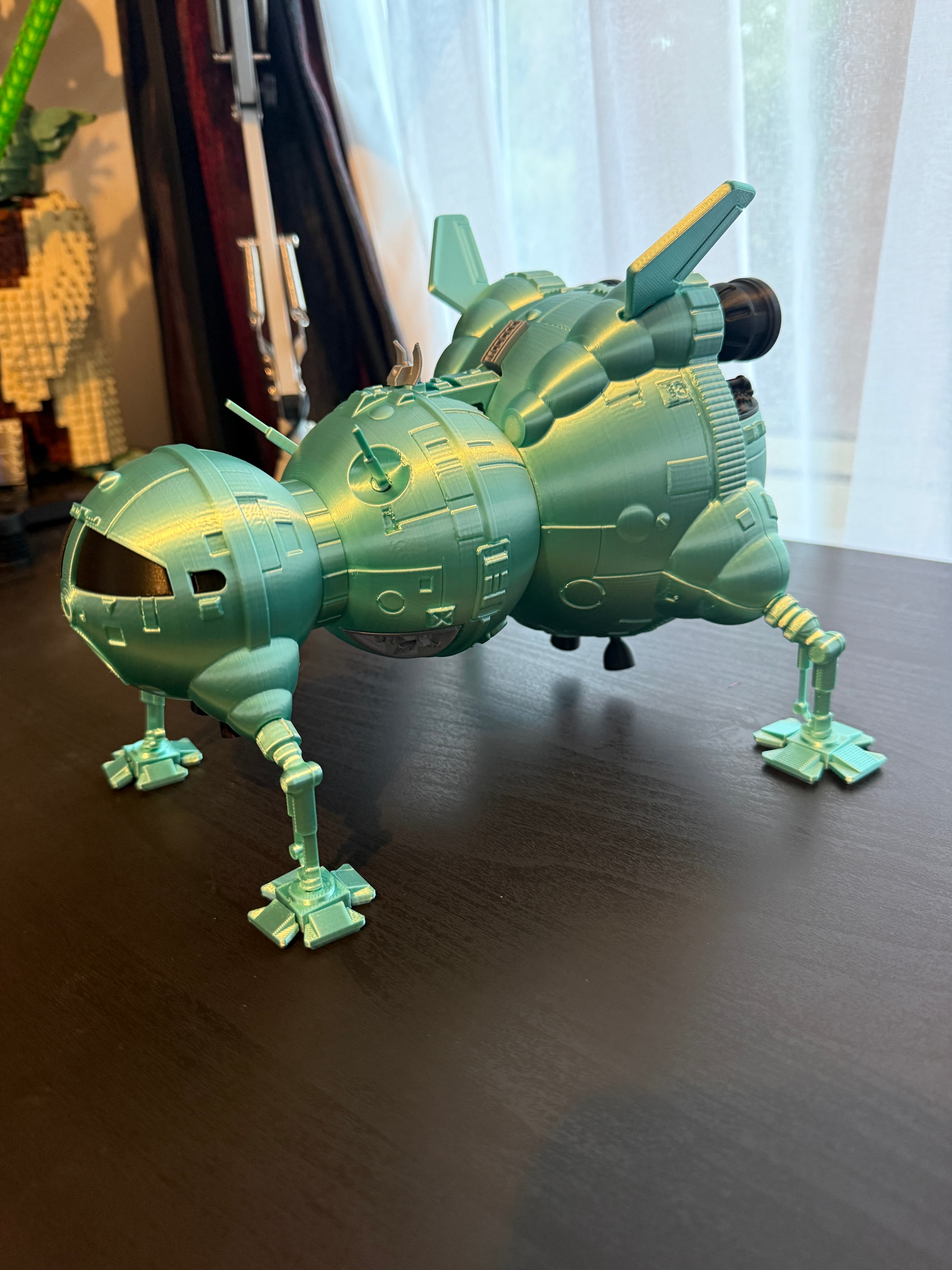 Printed this on my Elegoo Centauri Carbon at 165% on "Silent" with Mint Silk Green, Silver and Black Filament (all from Elegoo).
It is slightly lighter than the actual model should be as I wanted to ensure that under the lighting that I have it in more of the fine detail was visible.
Total print time was maybe around 24 - 48 hours as the first attempt on the Cockpit did not go great due to a mix of too high a print speed and not running the model fan fast enough.
Very nice model! Awesome stuff and thank you Fabs365 for making such an awesome Starbug!