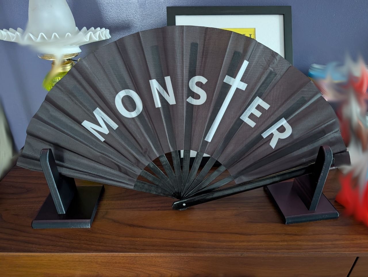 Great model! Unfortunately, the fan I wanted to display is gigantic, so, I needed to get a bit creative.
Scaled it up 200% on the X and 275% on the Z and added a negative part to the middle to split it in half and then moved a bunch of the base below the bed (the Z scaling gave a lot larger base than I wanted). Everything done in the slicer, so, not really a remix or anything.
Used some dual color black/red silk PLA to give it a bit of a funky look.
Thanks again for the model and sorry that the only make so far is mine where I changed just about everything ... I know nothing about actual modeling though, so I absolutely couldn't have made it without your model!