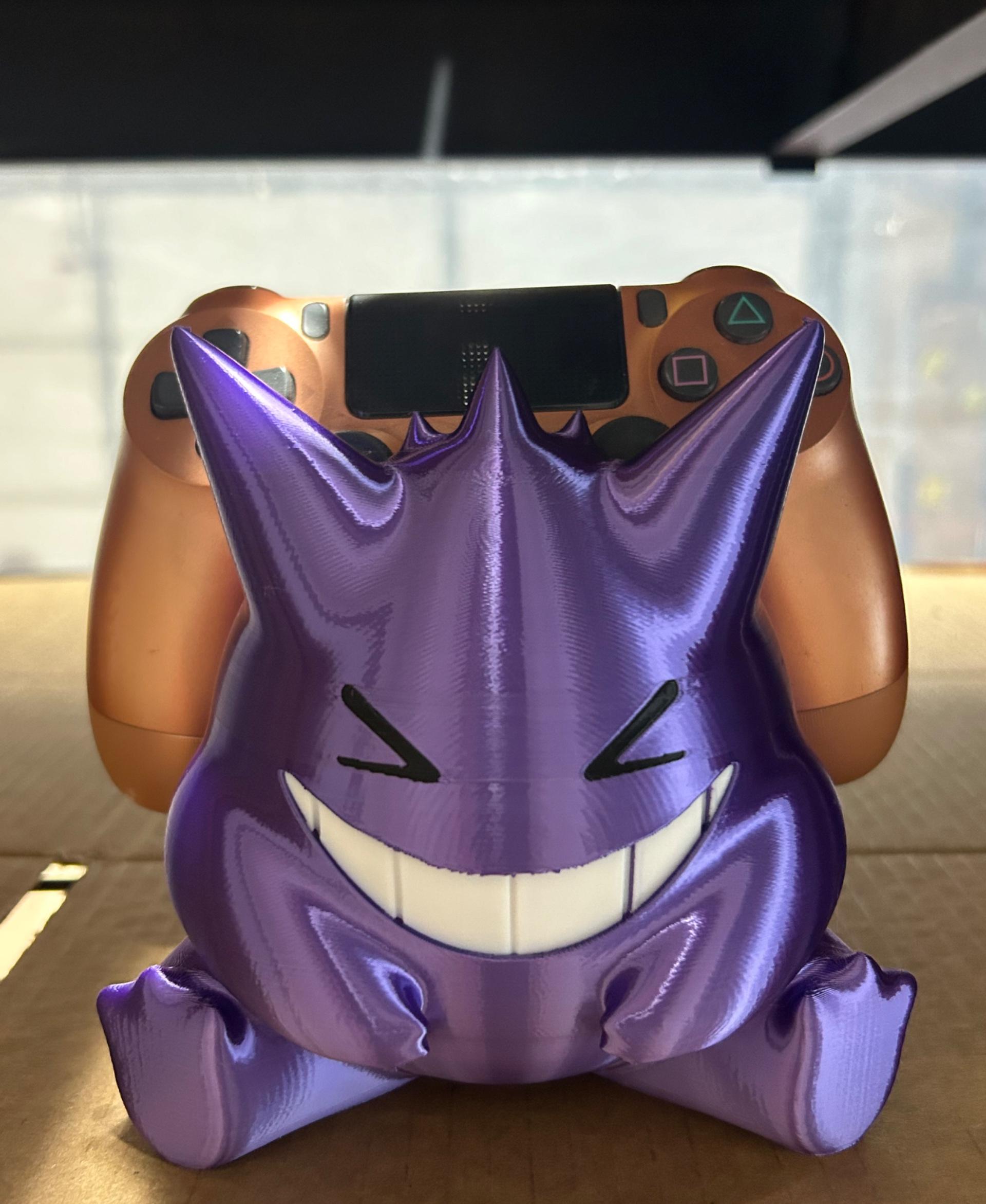 Gengar Controller Holder V1  - I opted to forgo the PlayStation. Model prints wonderful. I did have an oops on painting the mouth but that's on me.  - 3d model