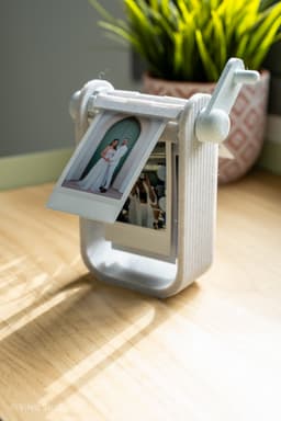 INSTAELA: Mechanical Rotary Photo Display - 10-Piece 3D Printable Instax Mini Carousel 3d model