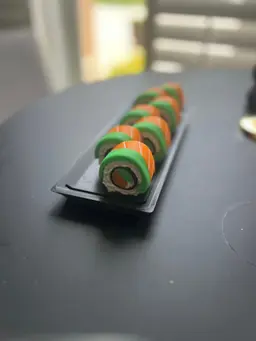 I became OBSESSED with these adorable sushis! I printed nothing else for like two weeks! I made so many different combinations and most of them turned out soooo gorgeous. The only ones I didn't love were because I tried to use filament I had on hand and the colors didn't fit or wipe properly, given I didn't adjust settings to adapt. I'm new at this! I also got a message from my bambu slicer that told me the rice should be "simplified" and both the rice and the filling needed to get "fixed" by a 3rd party site because of "manifold edges"(???), and this got confusing for me. Also, I purchased the keychain attachment from the link, but it didn't come with any directions and felt overall too small anyway, so I will have to go in person to a craft store to find the right kind of keychain. That kind of thing can be so hard to buy online since there's no sense of scale. Any advice would be welcome because I know this is what everyone I know is getting for Christmas! Delightful!!!! 3d model