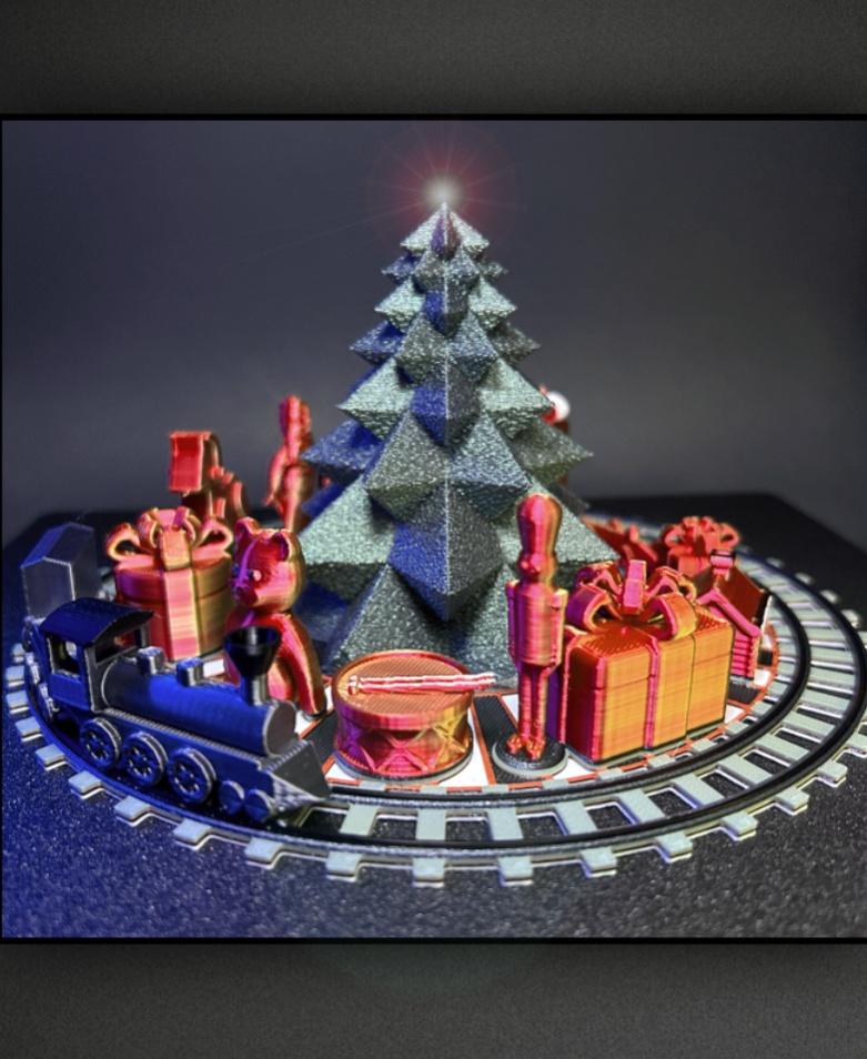 Toy Train and Presents Around the Tree - RetroMaker with Tree from LayerXLayer - https://thangs.com/designer/layerxlayer/3d-model/Christmas%20Tree%20Tea%20Light%20-%20Tall%20Version%20-%20Vase%2FSolid-963769 - 3d model