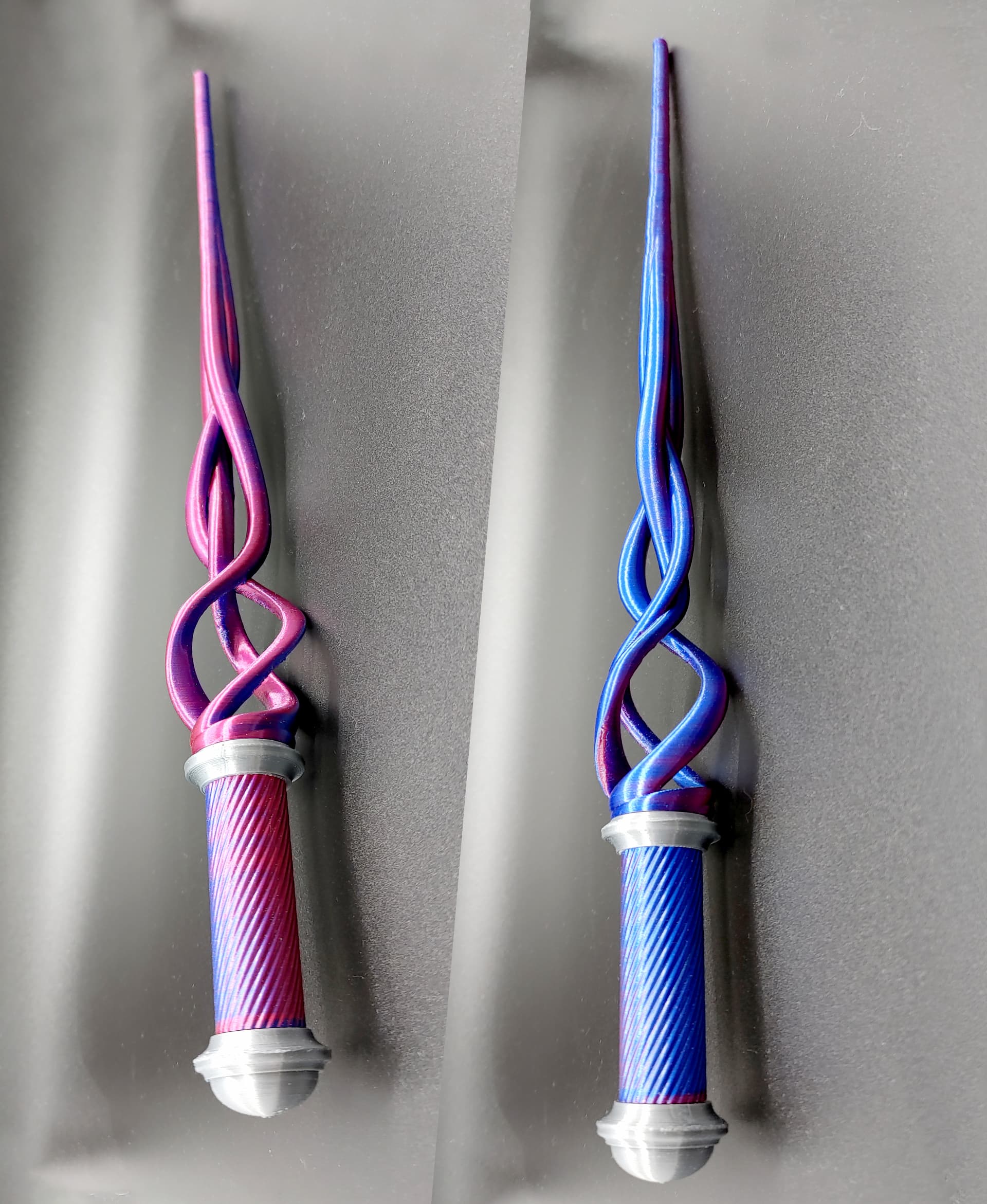 My Wand by Bugman_140 in Eryone dual color silk blue and red PLA and PolyMaker Chrome Silk PLA.
(same print shown from two different angles)