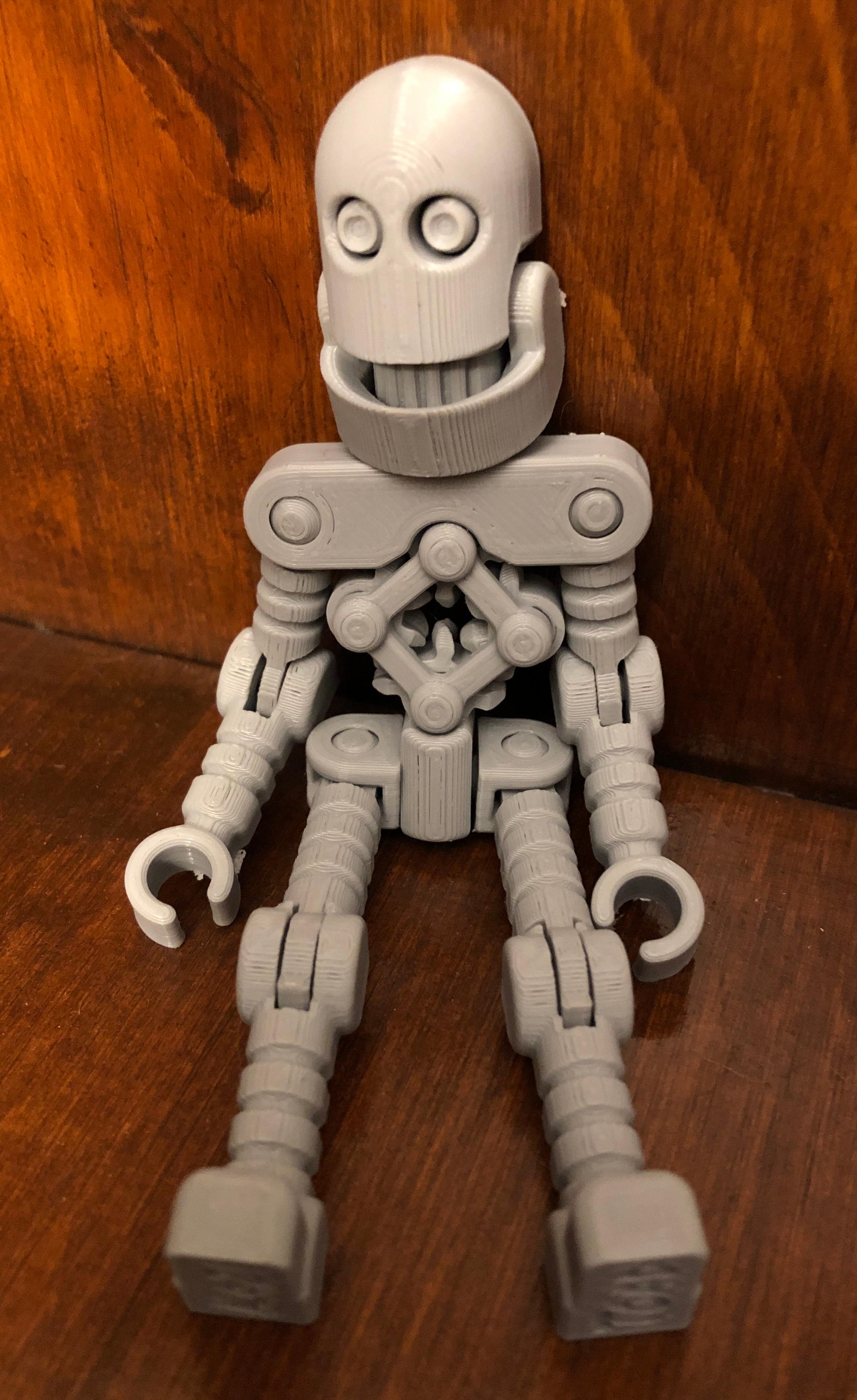 Benchmark Bot - First try with suggested settings on an Ender 3 Pro. All joints work. One hip joint was tight, but then broke free and works fine. This is a great model. Thank you for sharing it. I'm printing the accessories now :-) - 3d model