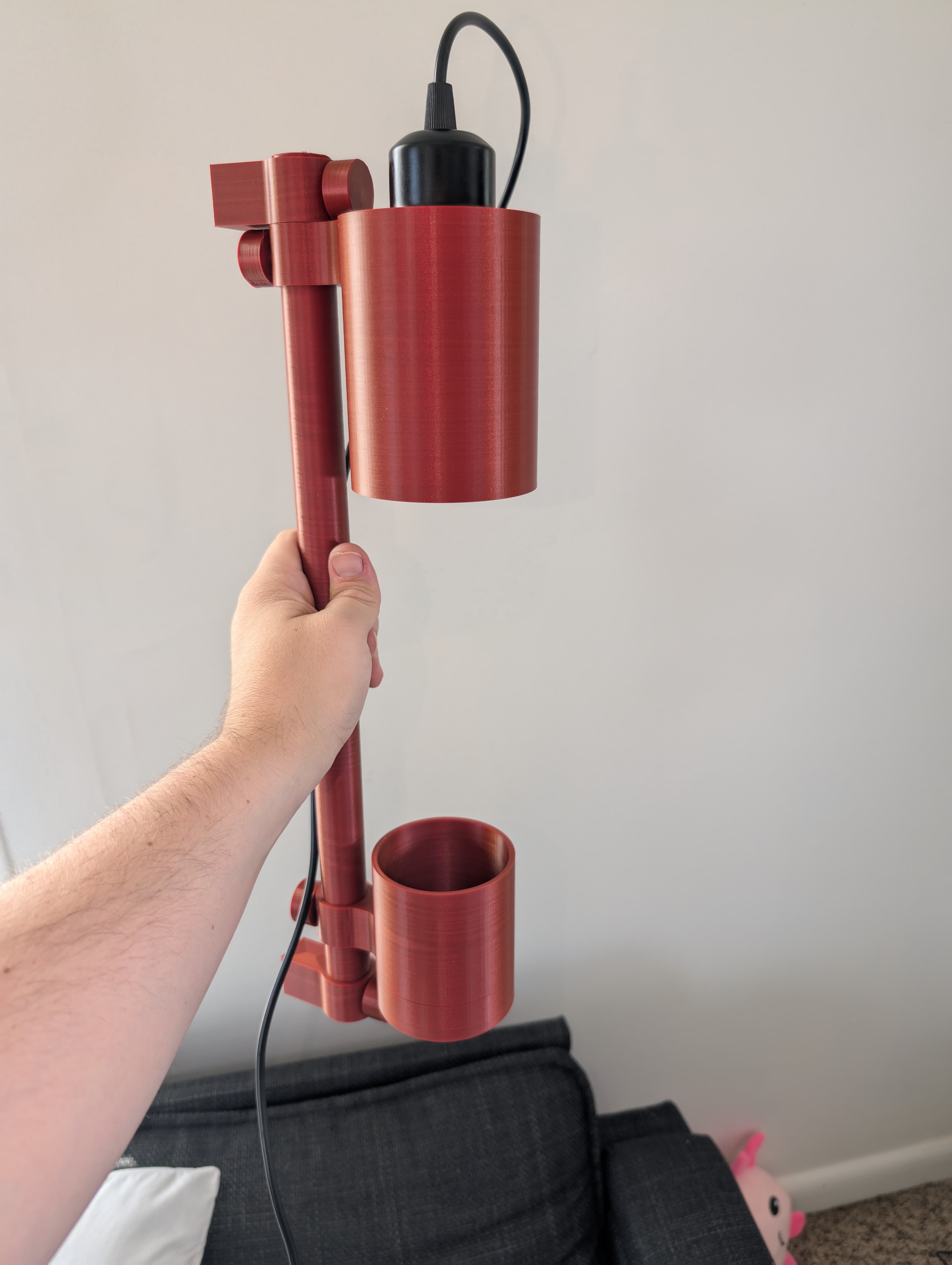 Absolutely beautiful light. Getting the cord to go through the rod requires something of a hat trick; would also suggest making the set screws have a shorter head, to allow spacing the planter further down. Used a different, 10W led grow light.