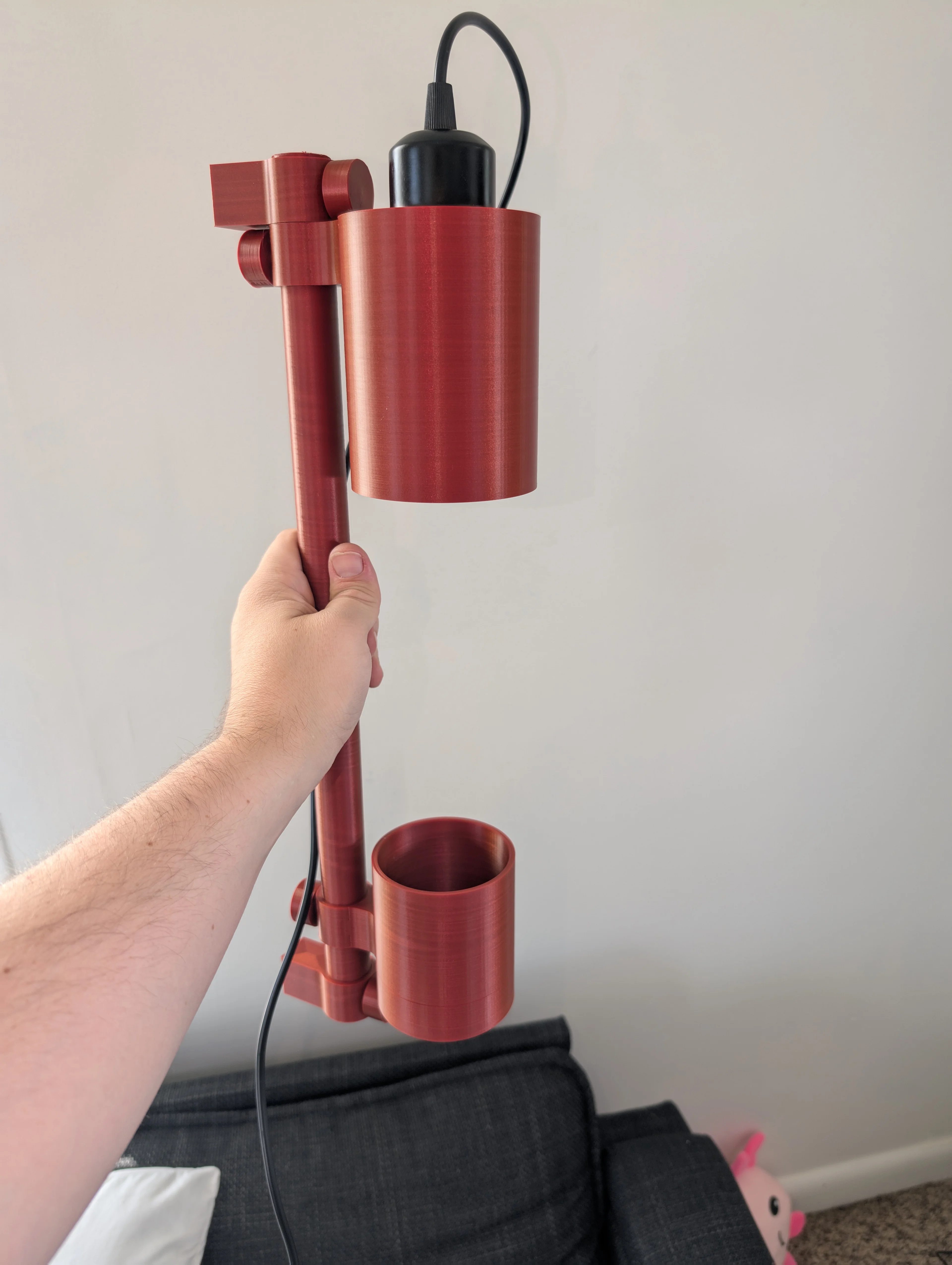Absolutely beautiful light. Getting the cord to go through the rod requires something of a hat trick; would also suggest making the set screws have a shorter head, to allow spacing the planter further down. Used a different, 10W led grow light.