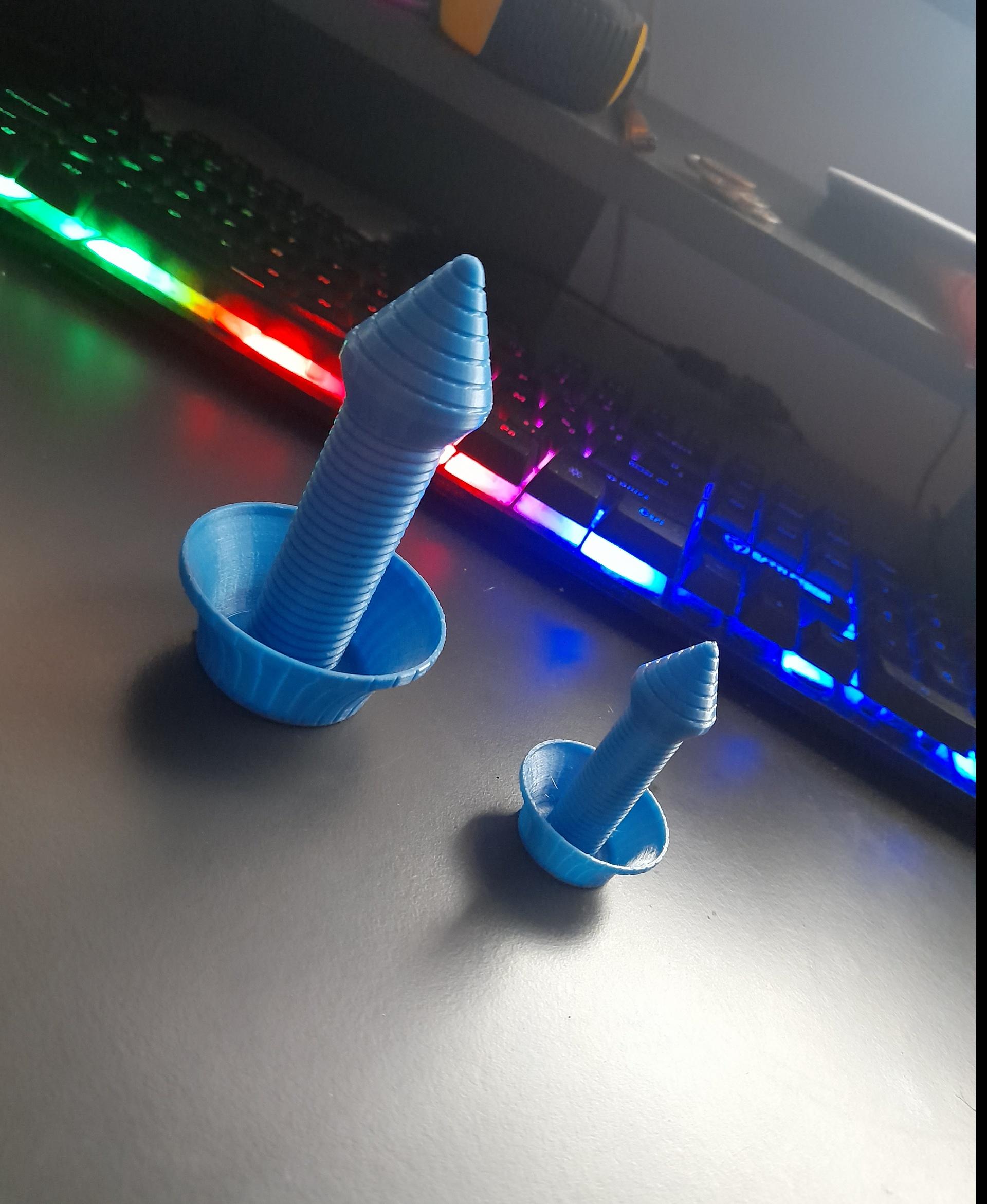 Collapsing Drill Sword Print-in-Place - hey love it butt got a little problem these are test prints the large one is 50% the small one is 30%
everything is good butt the small one got no inside and the big one melted to gether bed is on 50 heat nozzle 200 any tips ? - 3d model