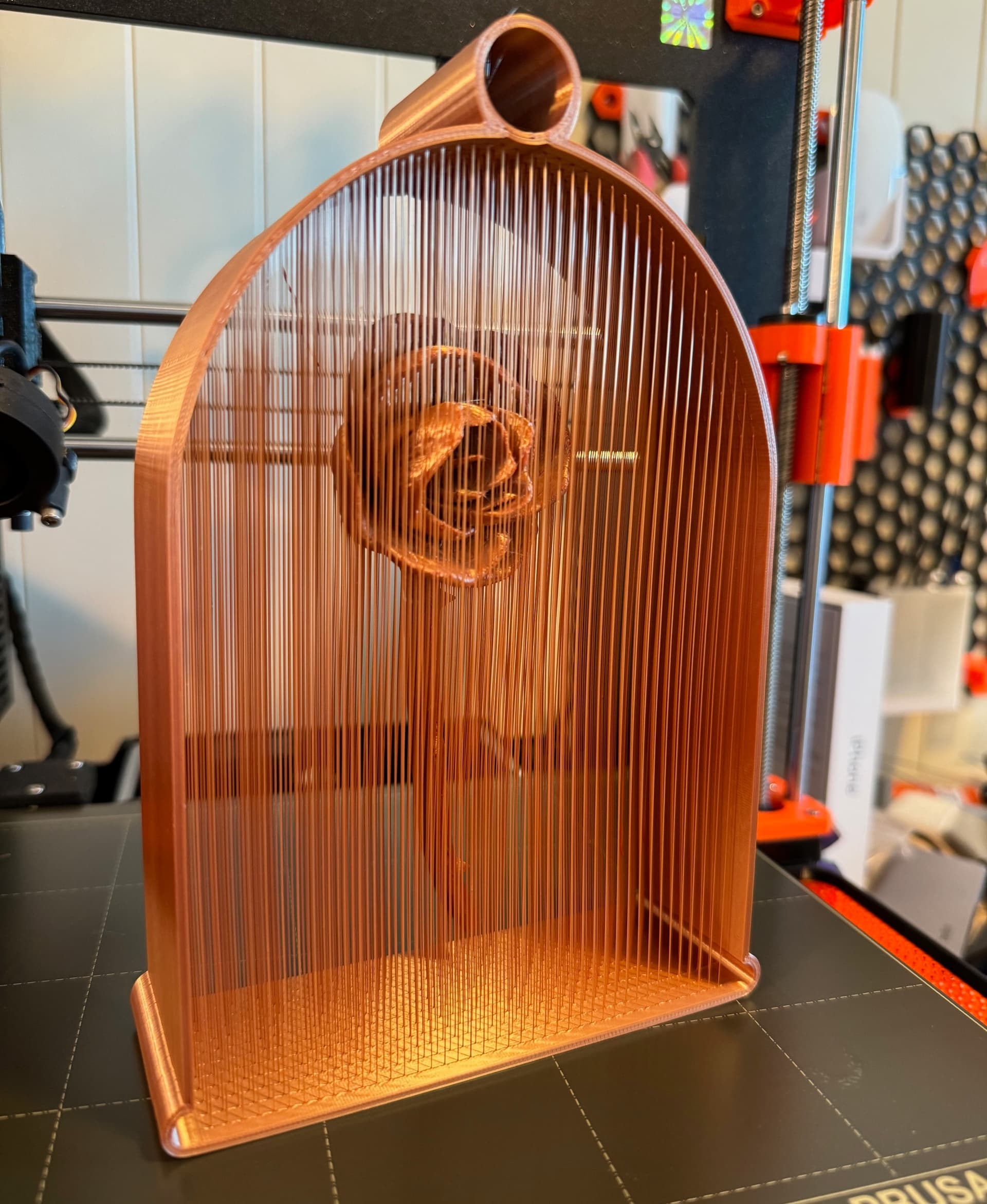 Cool model! 7-8 strings broke while printing in the bottom-most layer, but was able to remove most without breaking more strings. I don't have an enclosure, so one corner lifted causing a minor layer shift.