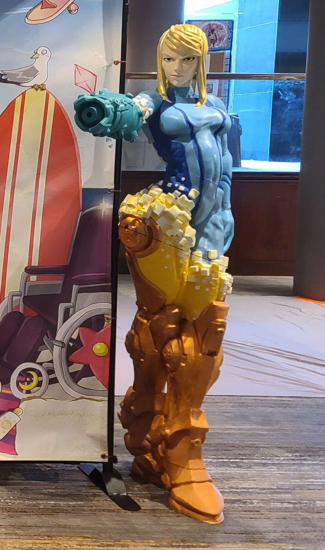 5' 11" tall. She was one of the most popular statues I brought to a convention