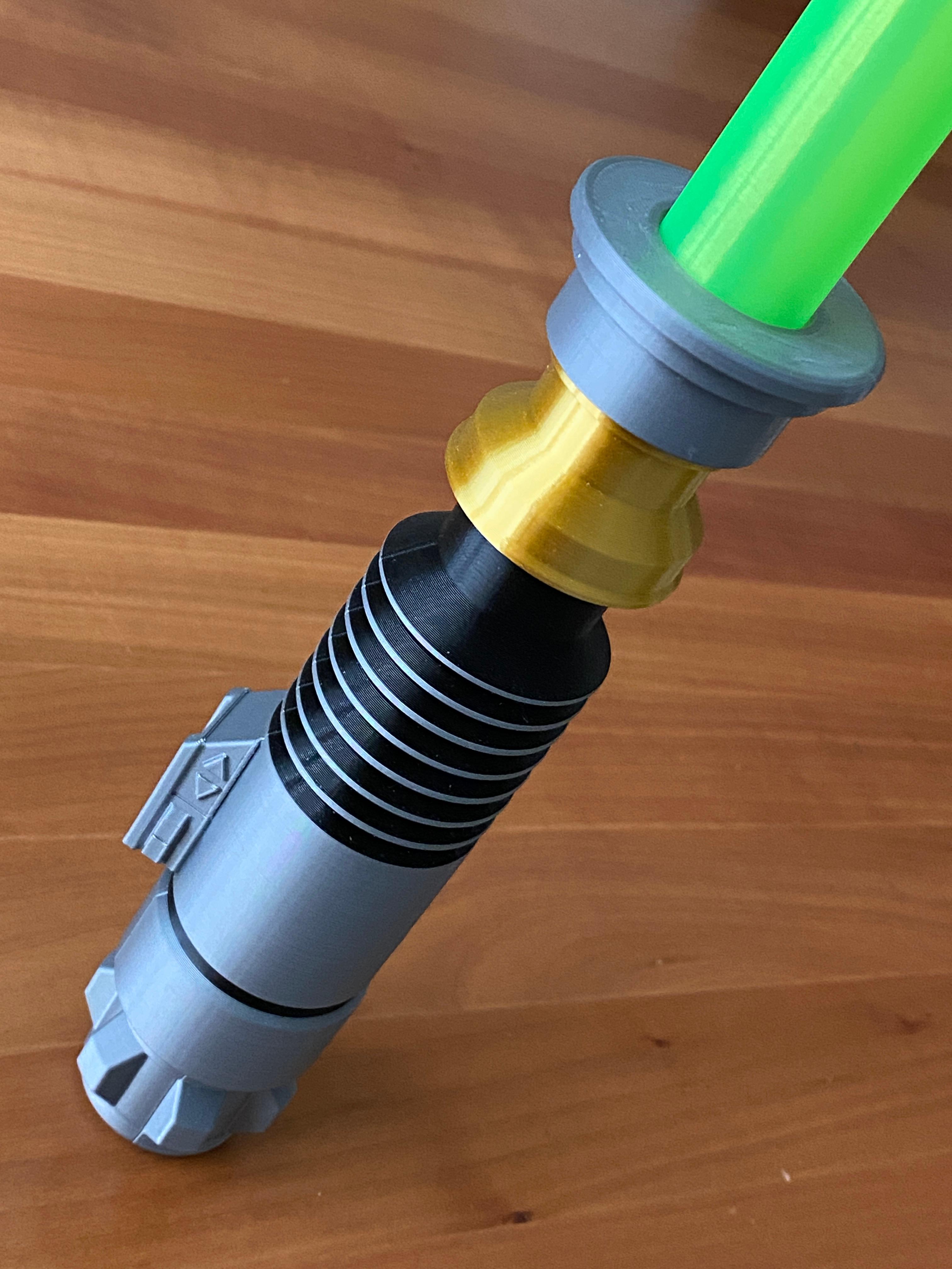 Collapsing Lightsaber - My take on it - first lightsaber for me, came out just fine. Printed on a slightly modified Ender 3v2, manual filament changes to achieve multiple colors.  - 3d model
