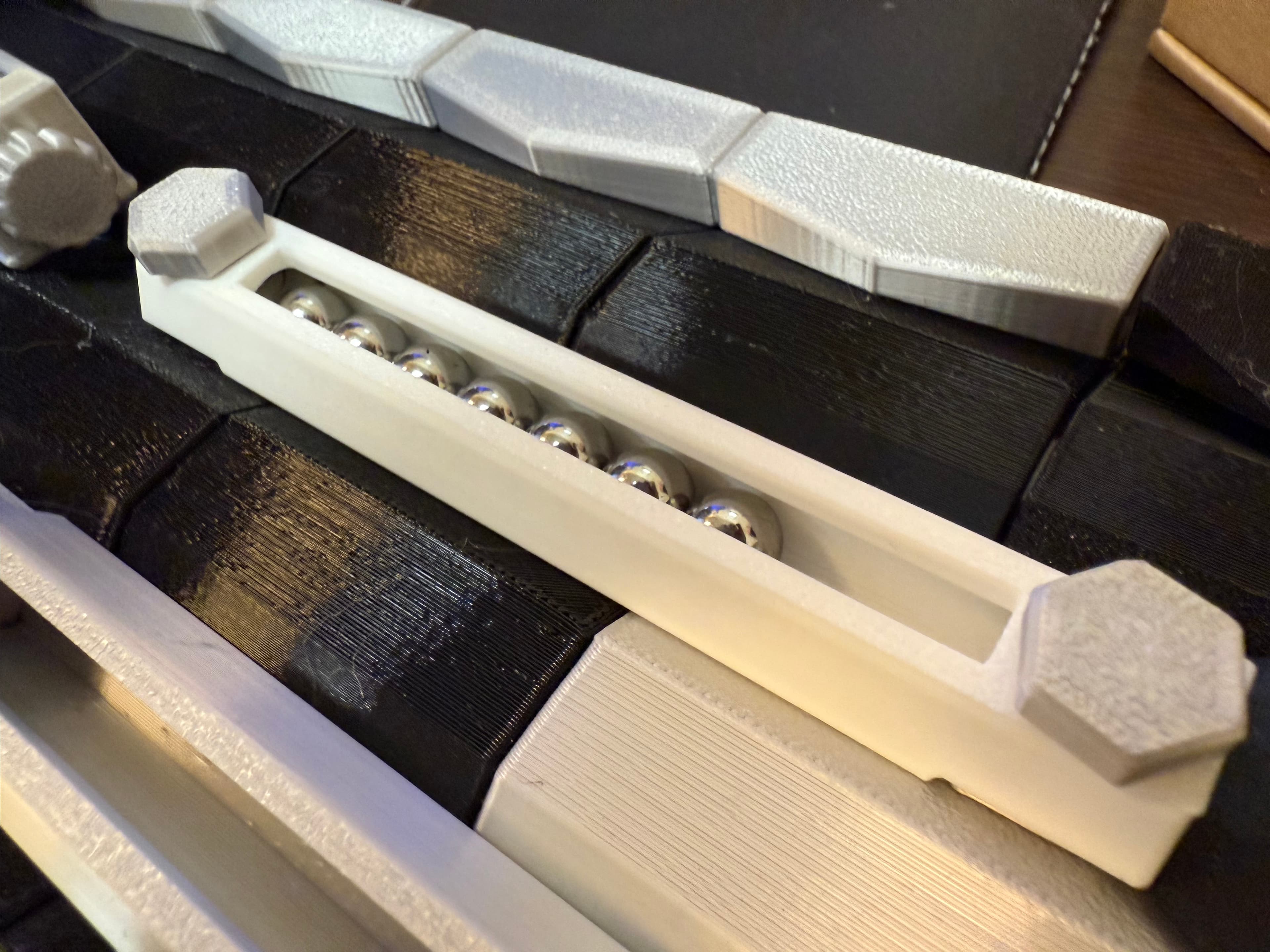 Printed perfectly. I appreciate how much better it fits. I do wonder though if there's an in-between that would keep (at least mostly) the de-threaded ends while still allowing one to use a bolt as a plug to close the piece and prevent spills. No idea.
But in the meantime, I'm excited to see which version my players prefer! Thanks for your work!