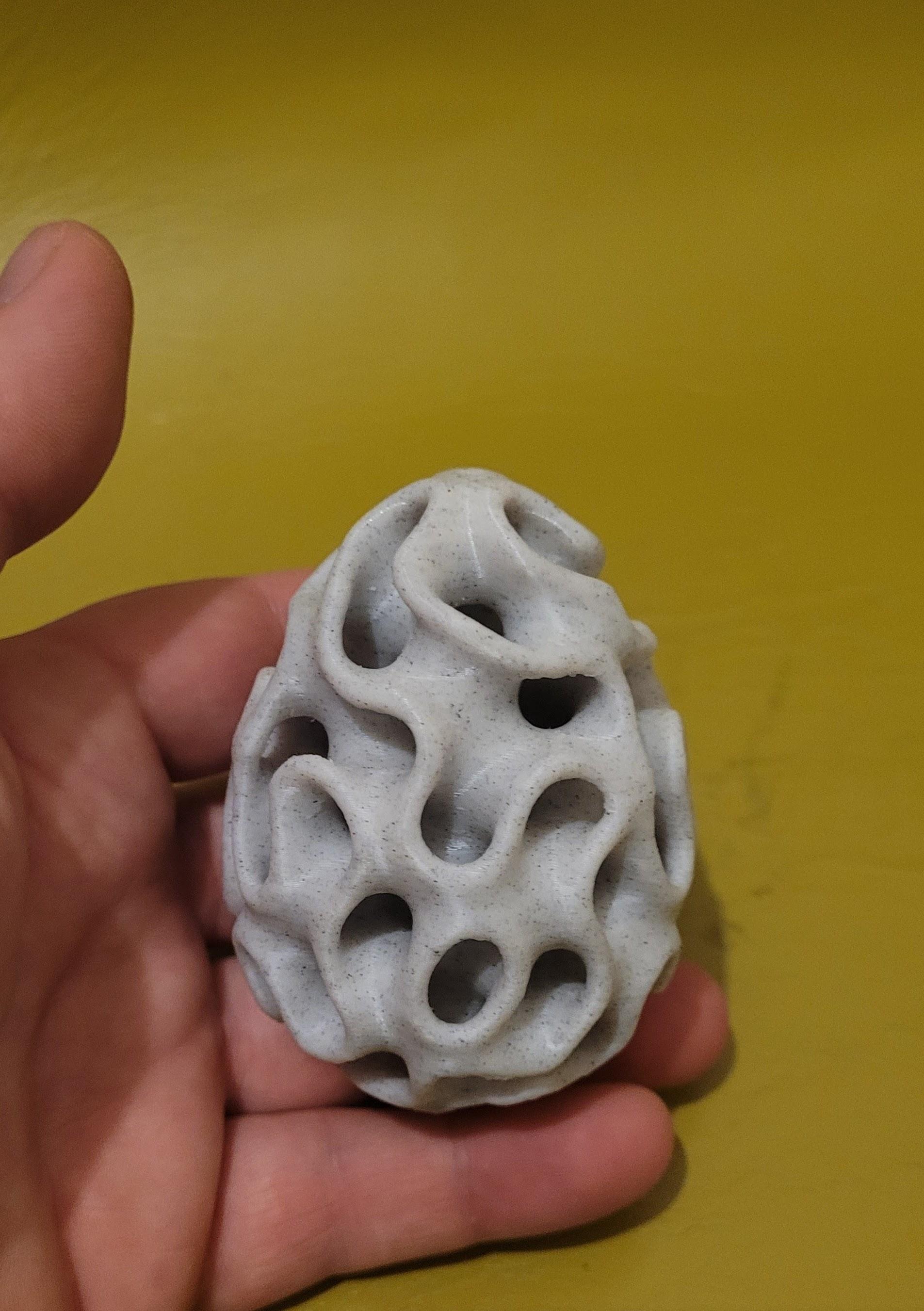 Schoens Gyroid Egg - printed the supported version in Marble PLA using a 0.6mm nozzle at 0.2mm layerheight. Supports were hard to remove but the result is nice. 
Thank you for sharing the design!   - 3d model