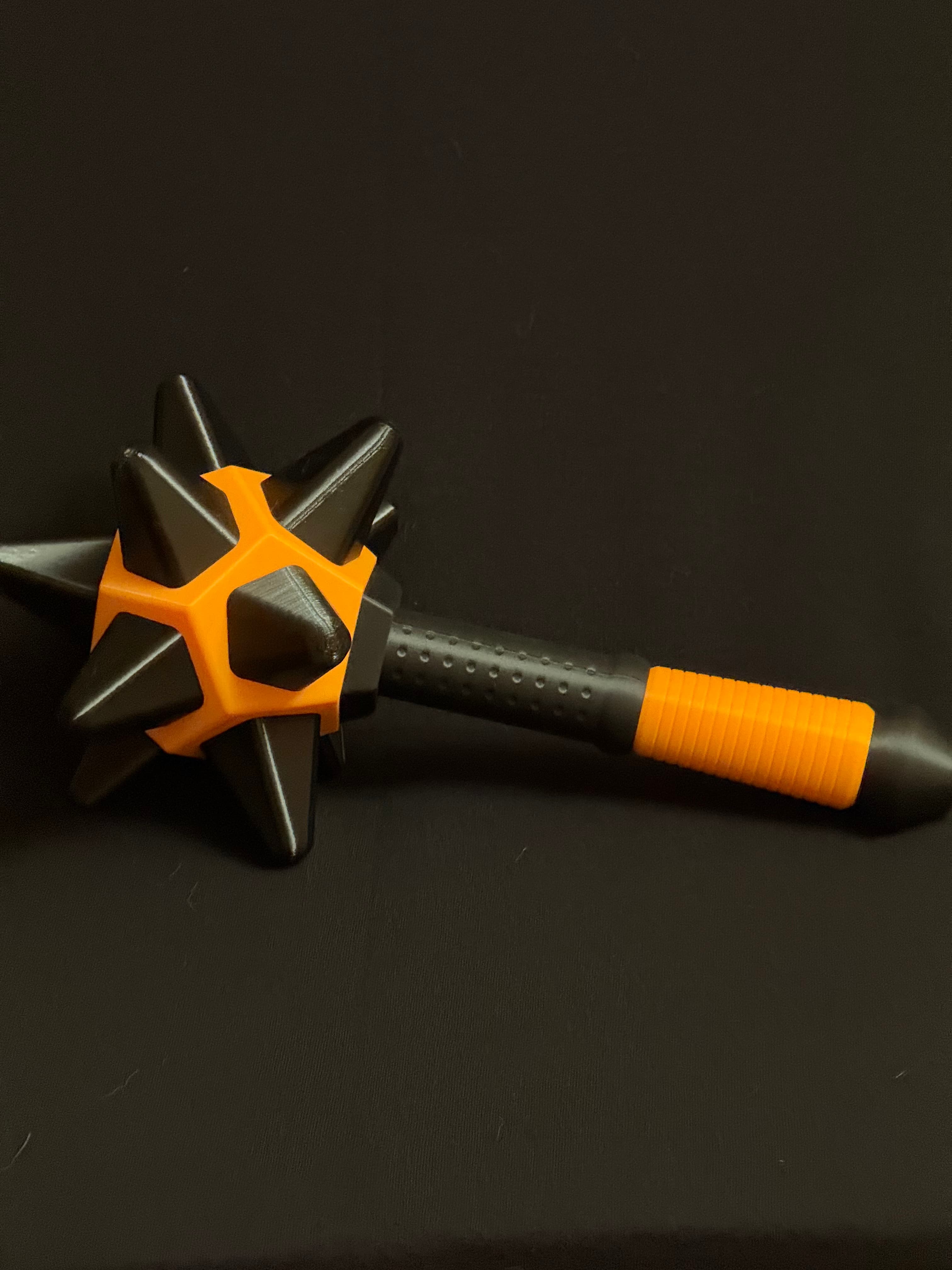 Awesome model. Spikes printed in TPU. Used Neon Orange for “ball’ and handle.
