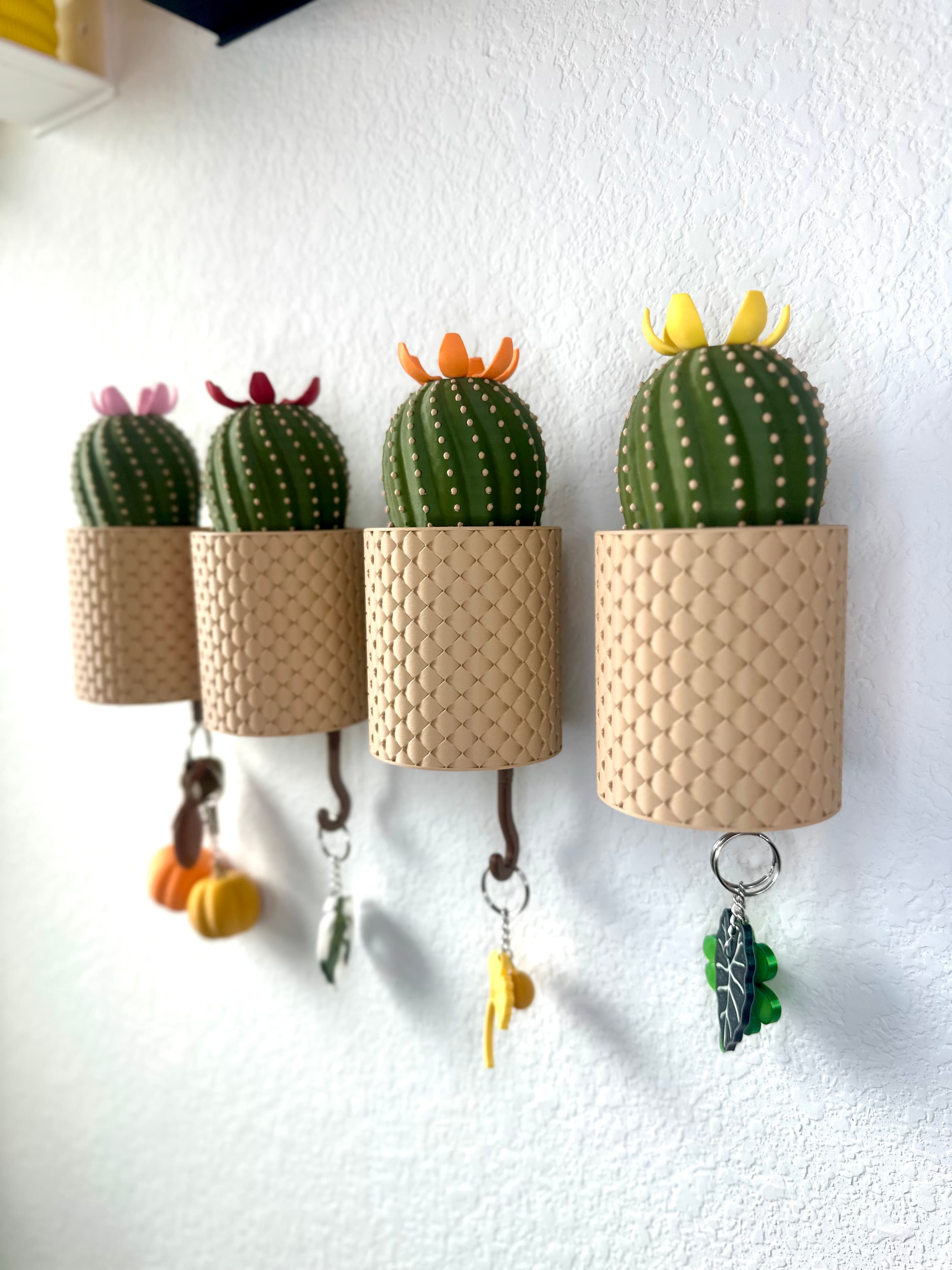 These are so fun! My son gets a kick out of playing with them on the wall too! I used the 3mf file and Bambu PLA. I also used different colors for the flowers so each person can have their own for their keys.