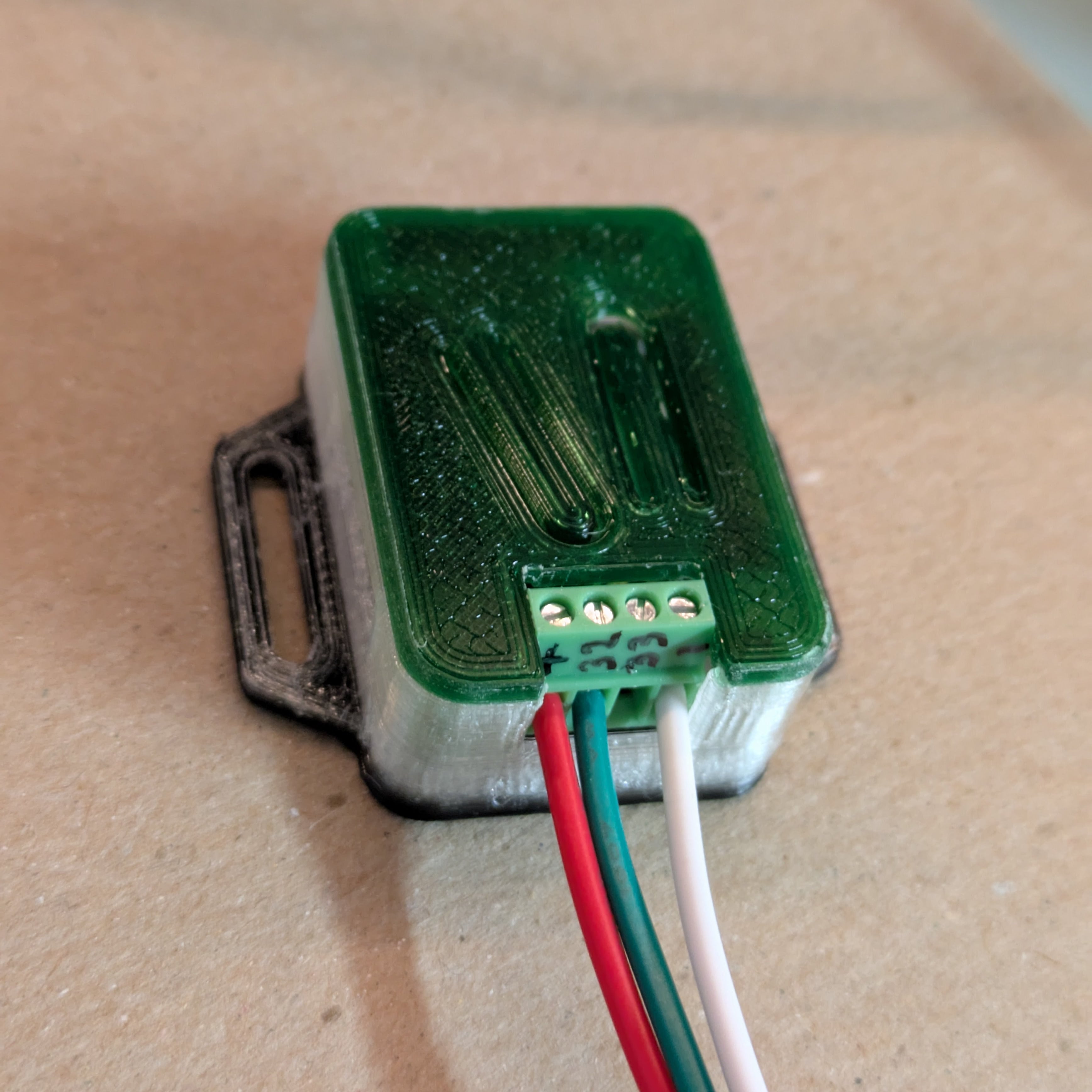 Adafruit Mini Sparkle Motion Snap-on Enclosure remix with wire terminal cut-outs 3d model