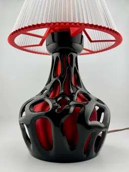 The base is made with PLA, the black part is finish with black gloss finish acrylic paint. The shade is made from translucent PETG from Bambu Lab. 3d model