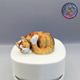 sleepy cat figurine 3d model
