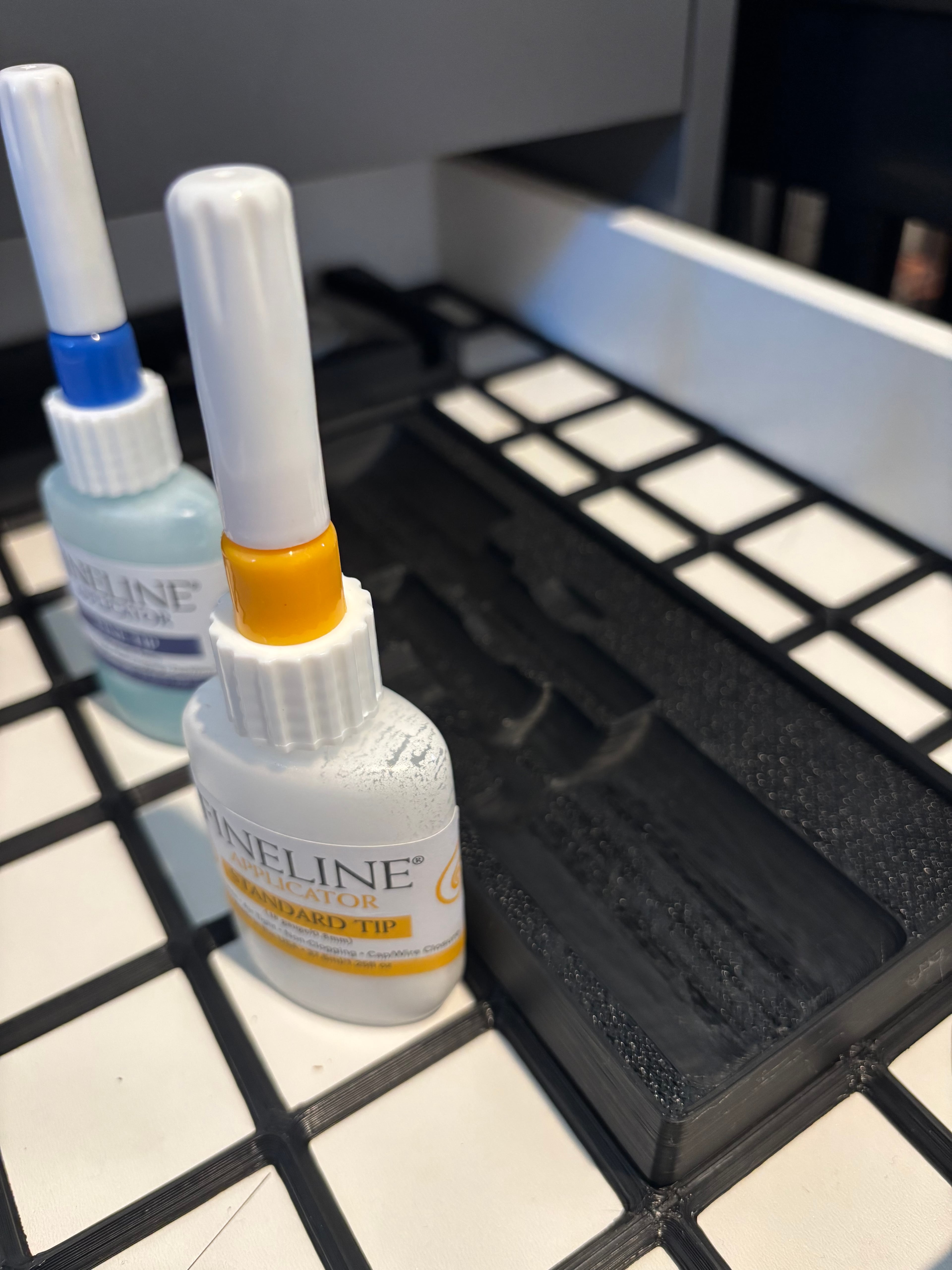 Two Fineline 1.25oz Applicators for Gridfinity 3d model