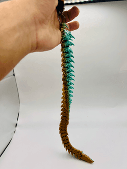 Sharphorn Articulated Flexi Keychain Dragon 3d model