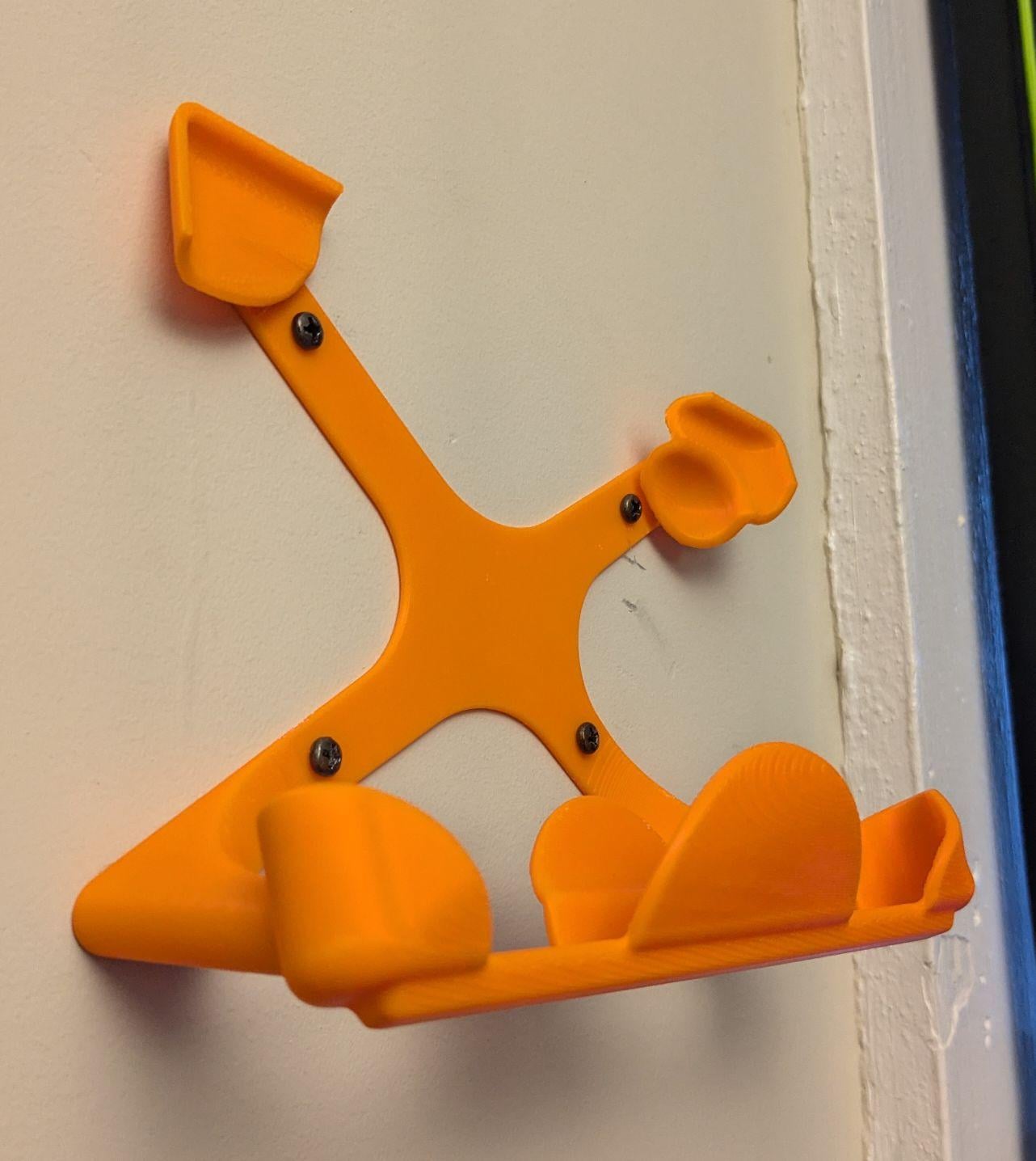 Wall-mount holder for Kensington Slimblade Pro (and semi-accurate "buck") 3d model