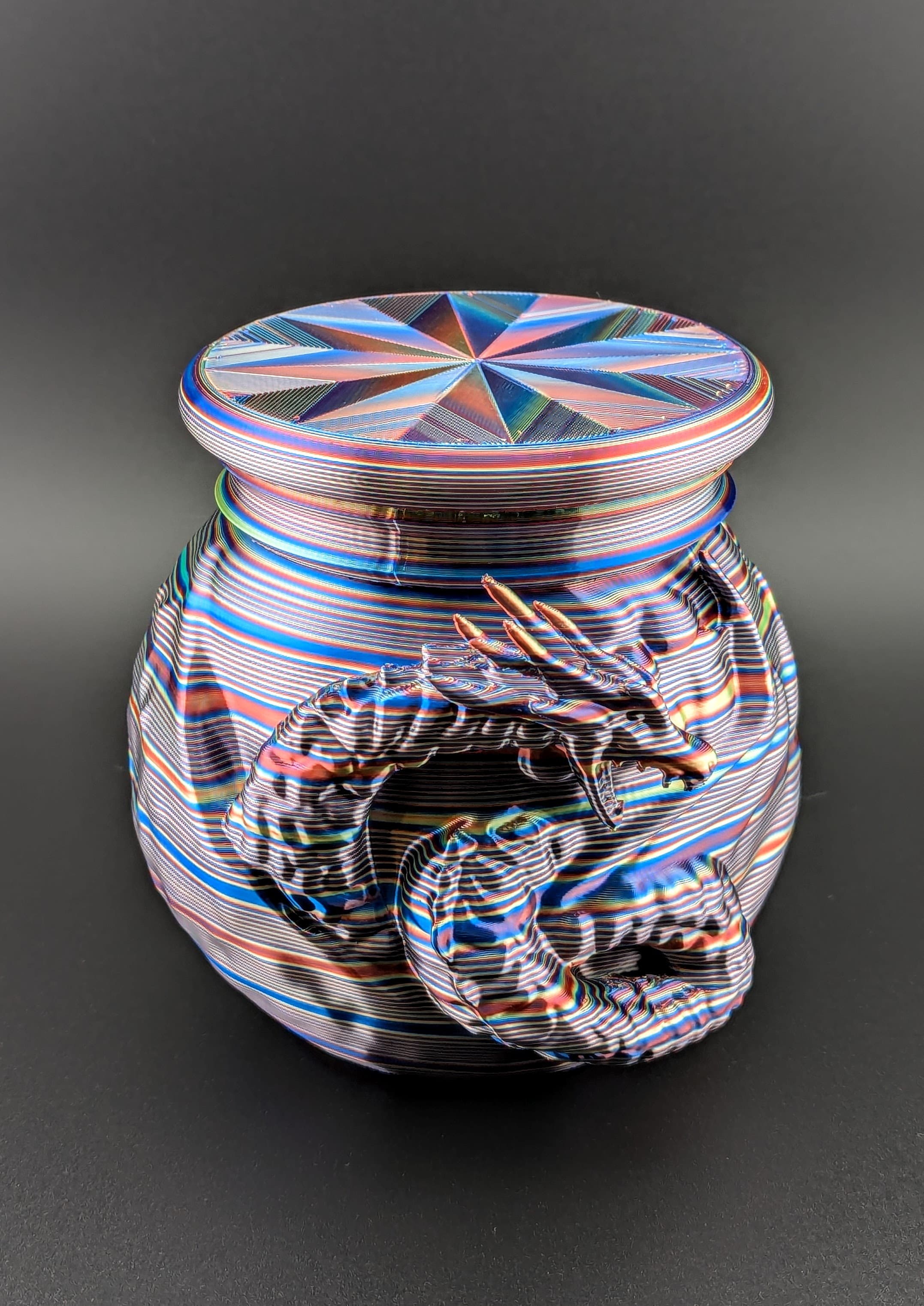 I love how this came out! I wanted to try something other than just a single color or paint, and this rainbow PLA really makes this one stand out. The lid fits well too.
I'd love to see more Jars like this, maybe with the Knight from your books ( or a viking, or a skull, etc etc ). These jars would look great on my shelves! Thanks!