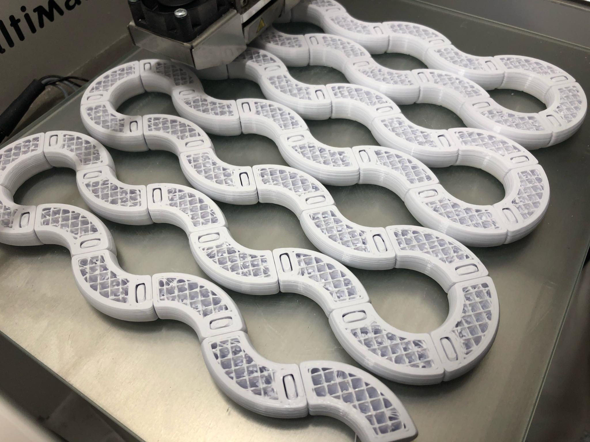 Twisty Tubes - Mid print pictures showing print-in-place design - 3d model