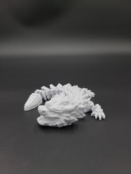 Snowfall, Winter Dragon Child - Articulated Dragon Snap-Flex Fidget (Medium Tightness Joints) 3d model