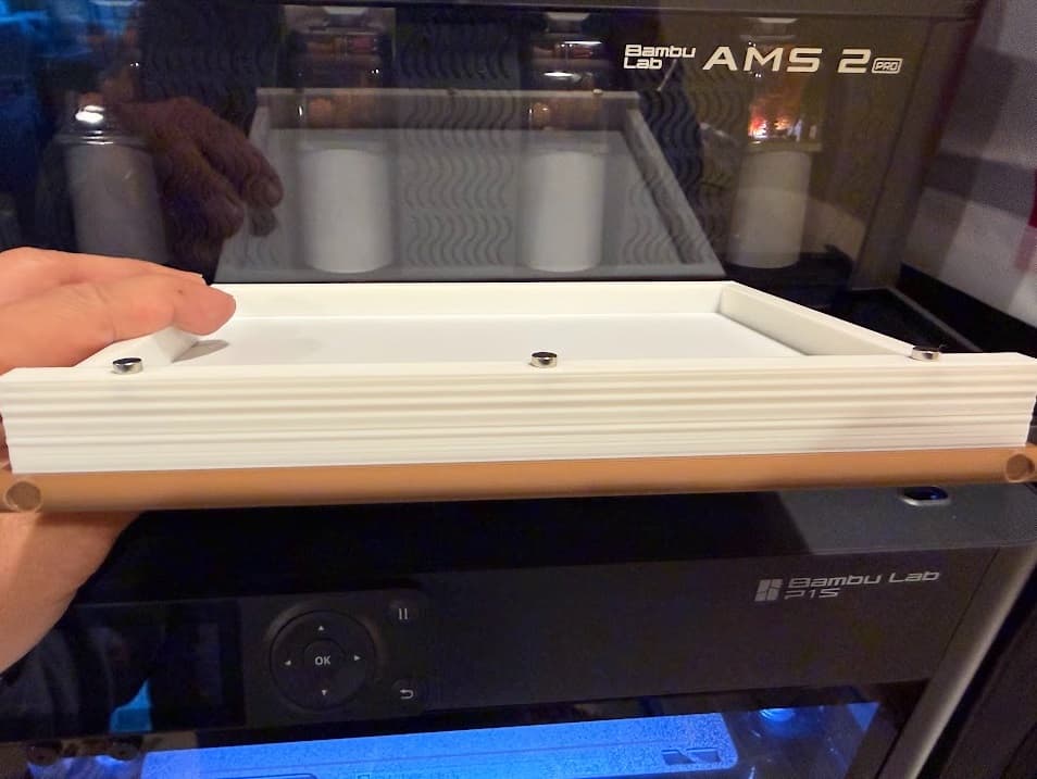 One tip about the magnets is that you need to check their polarity. I've only printed one side of the book and was able to insert them during the pause. The next step is that I'll put the opposite magnets on that printed part and wait for the second cover to pause and mate up the books to put the magnets in with their correct opposite polarity.